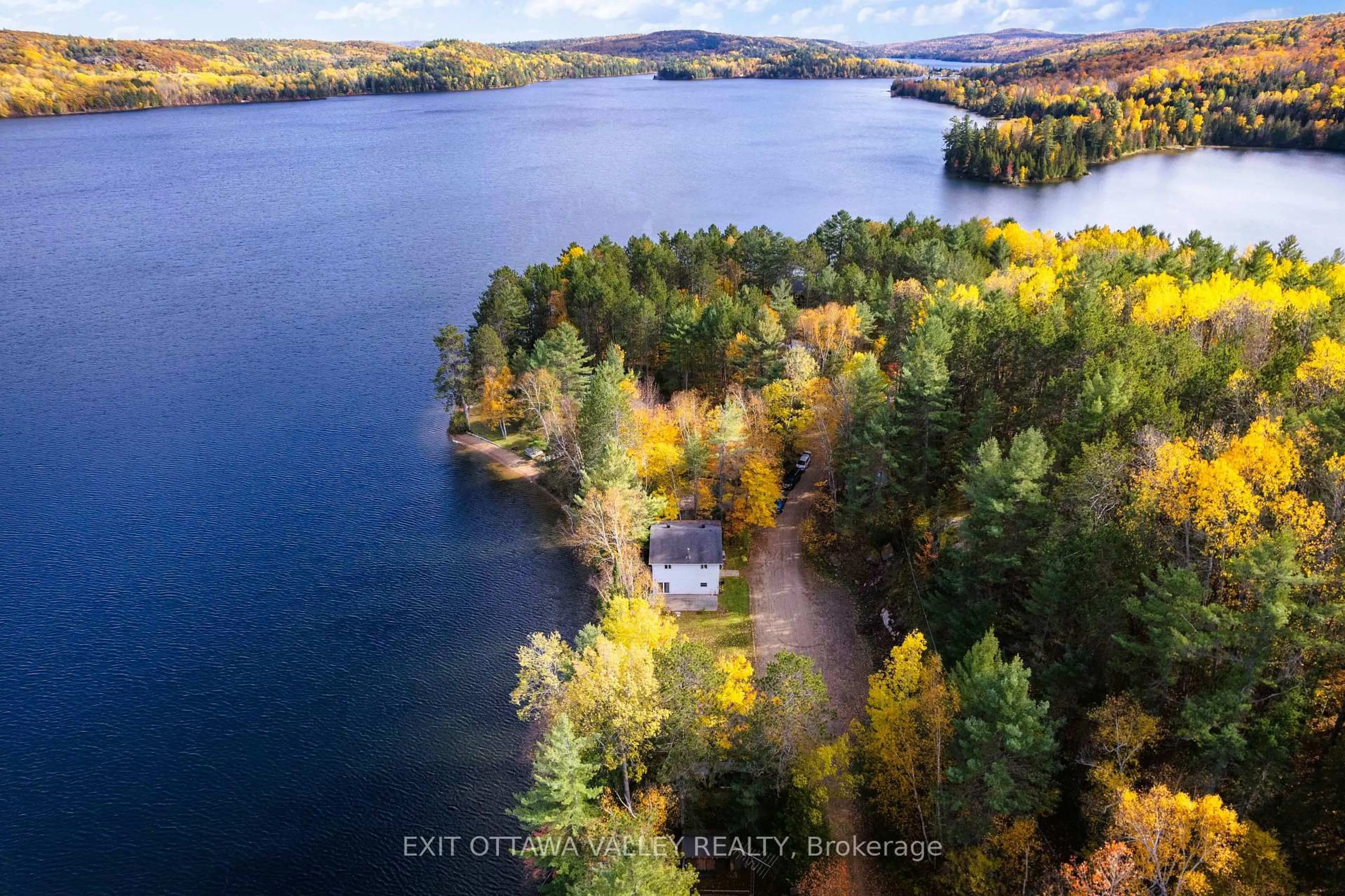 A pic from outside/outdoor area/front of a property/back of a property/a pic from drone, water/lake/river/ocean view for 88 Chris Mullin Lane, Barry's Bay Ontario K0J 1B0