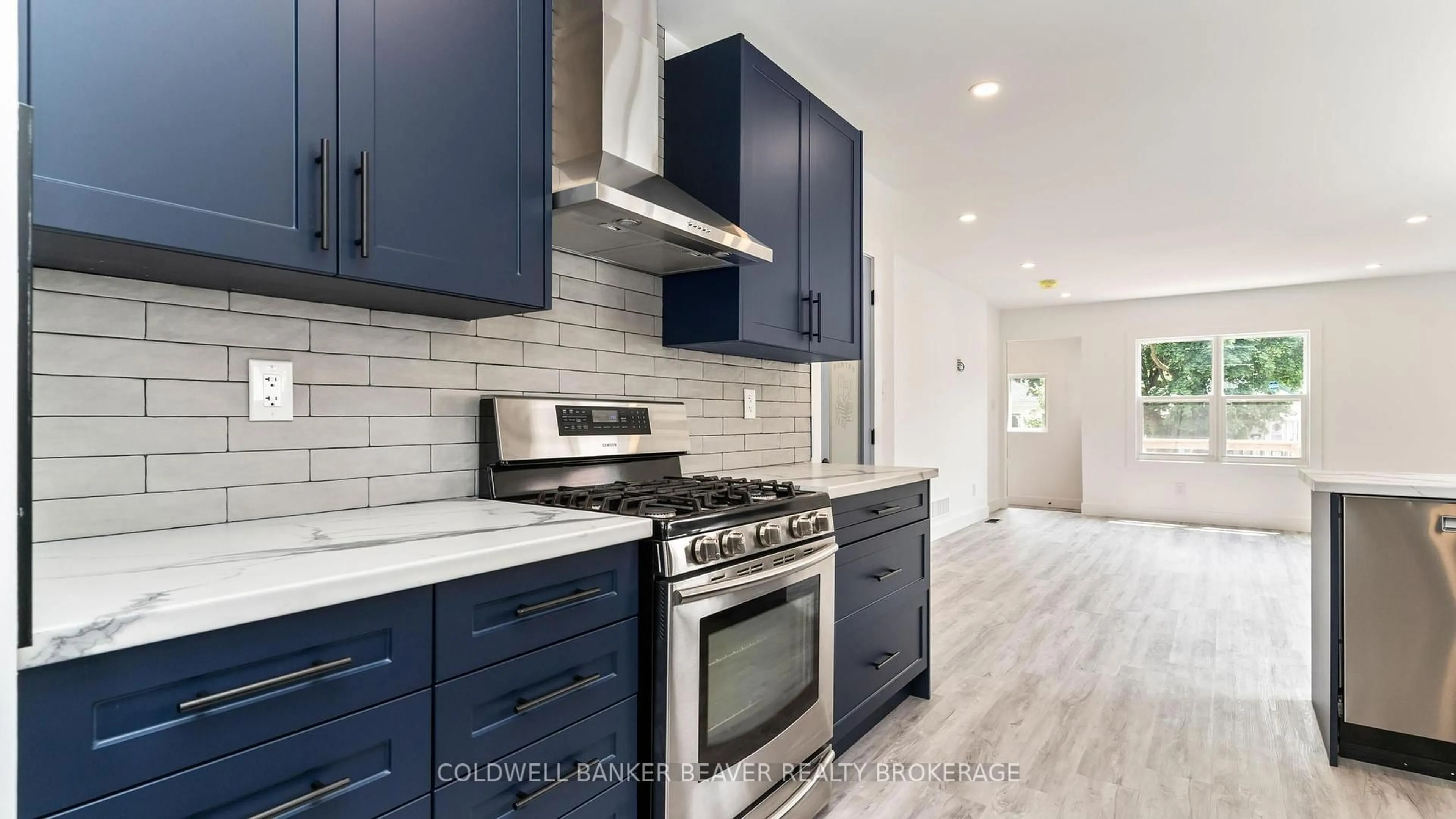 Open concept kitchen, ceramic/tile floor for 66 Dakin St, London East Ontario N5Z 1A3