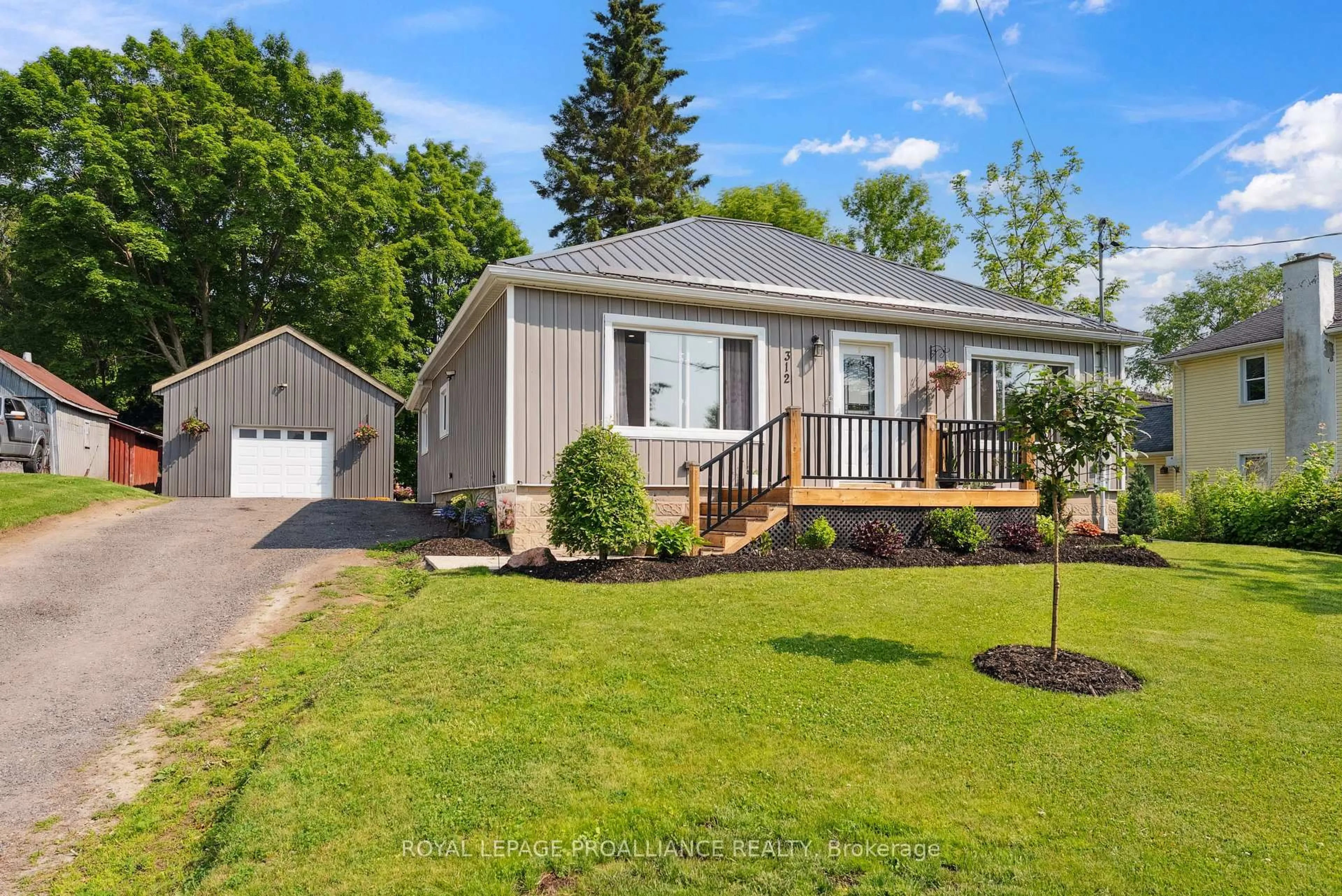 Home with vinyl exterior material, street for 312 River St, Tweed Ontario K0K 3J0