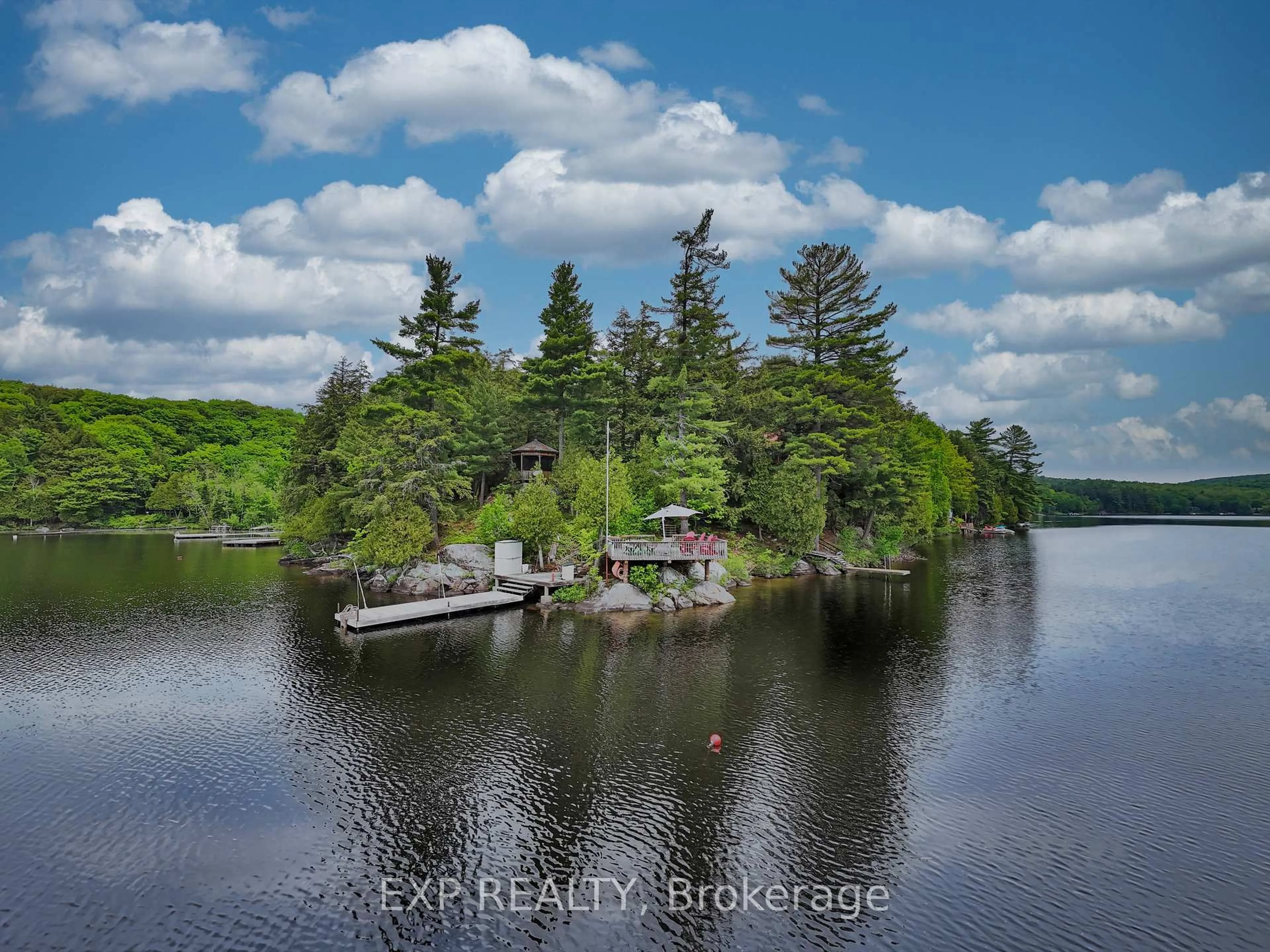 A pic from outside/outdoor area/front of a property/back of a property/a pic from drone, water/lake/river/ocean view for 230 Doe Lake Rd, Armour Ontario P0A 1L0
