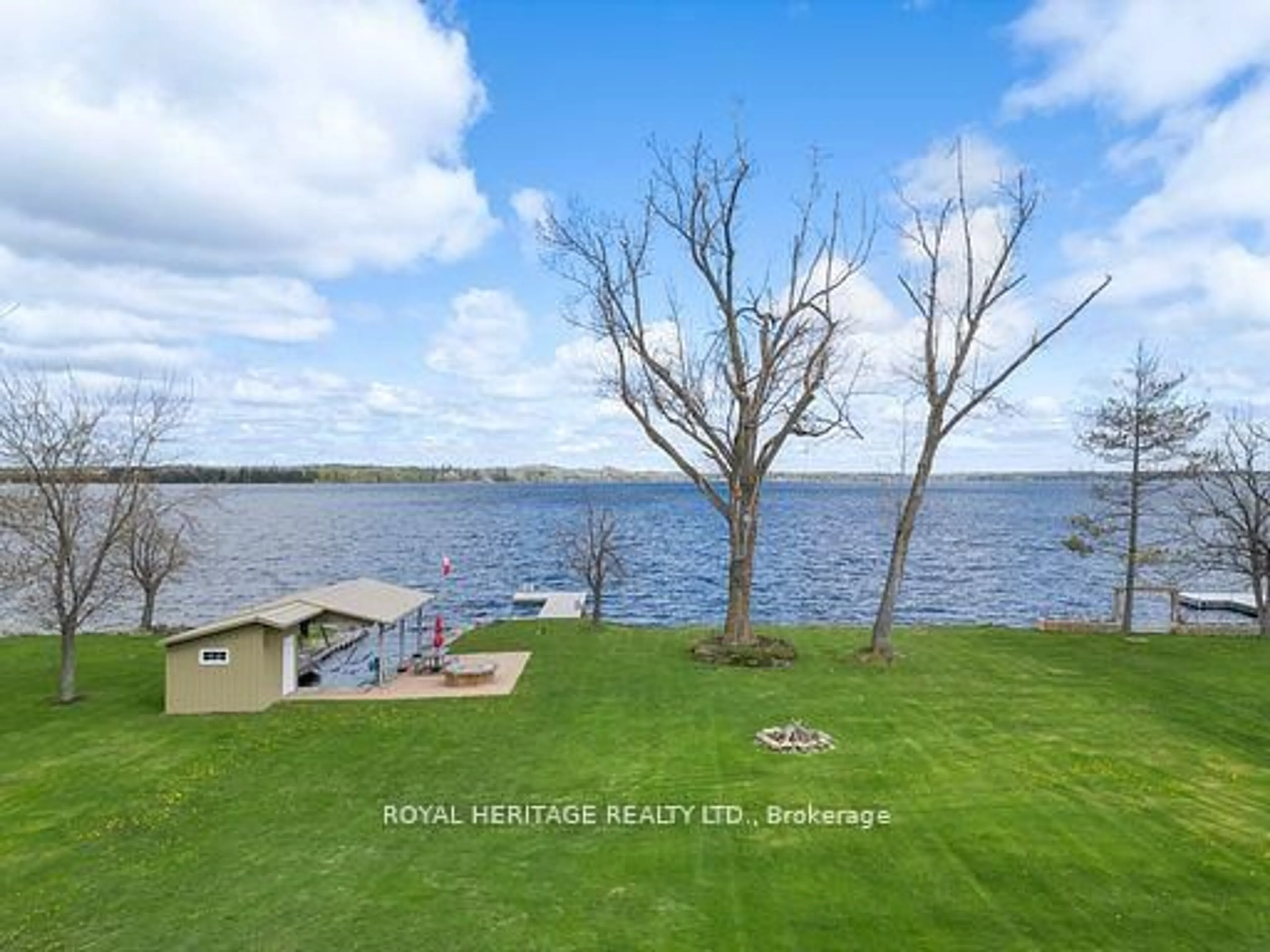 A pic from outside/outdoor area/front of a property/back of a property/a pic from drone, water/lake/river/ocean view for 7 North Service Rd, Kawartha Lakes Ontario K0M 1L0