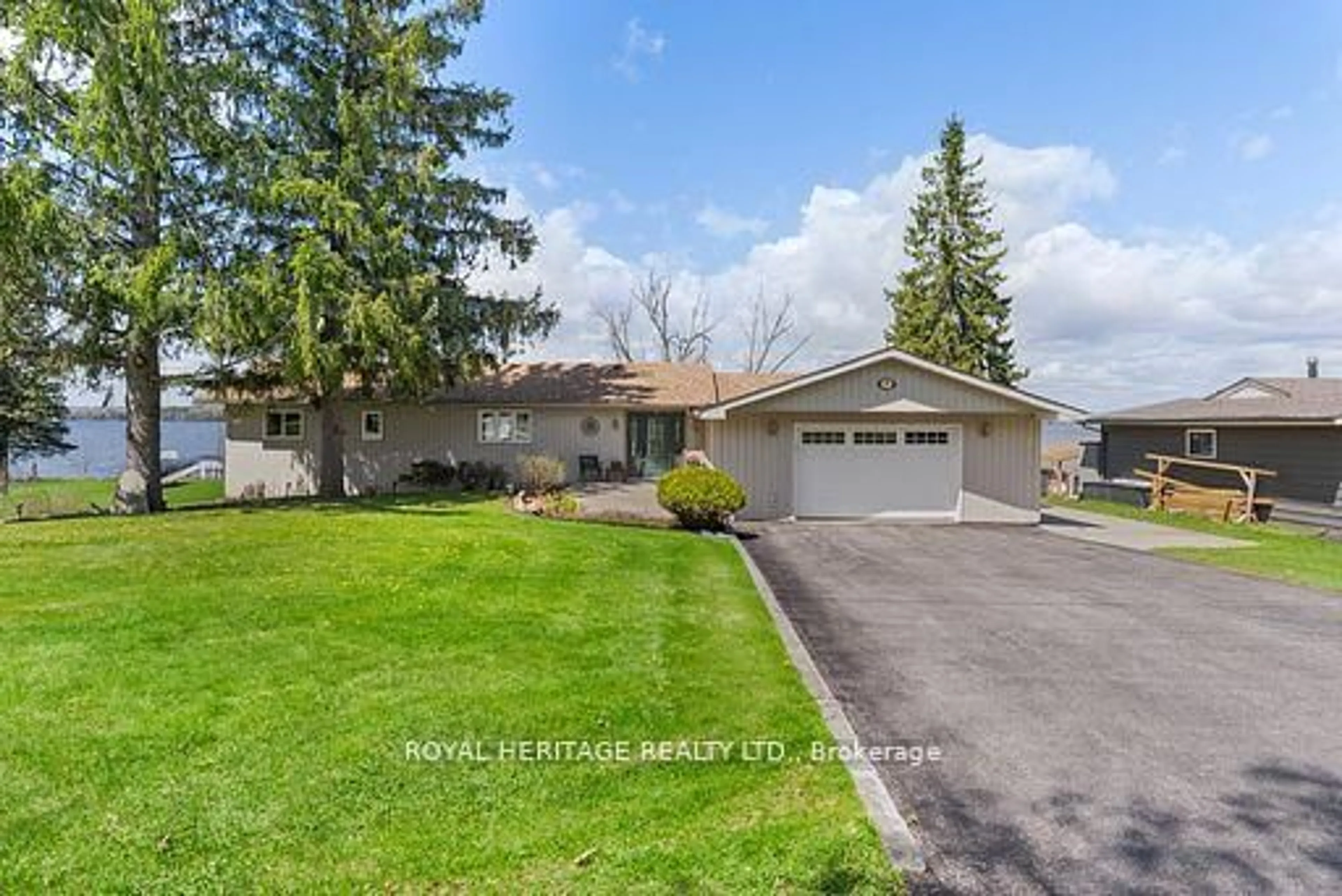 A pic from outside/outdoor area/front of a property/back of a property/a pic from drone, street for 7 North Service Rd, Kawartha Lakes Ontario K0M 1L0