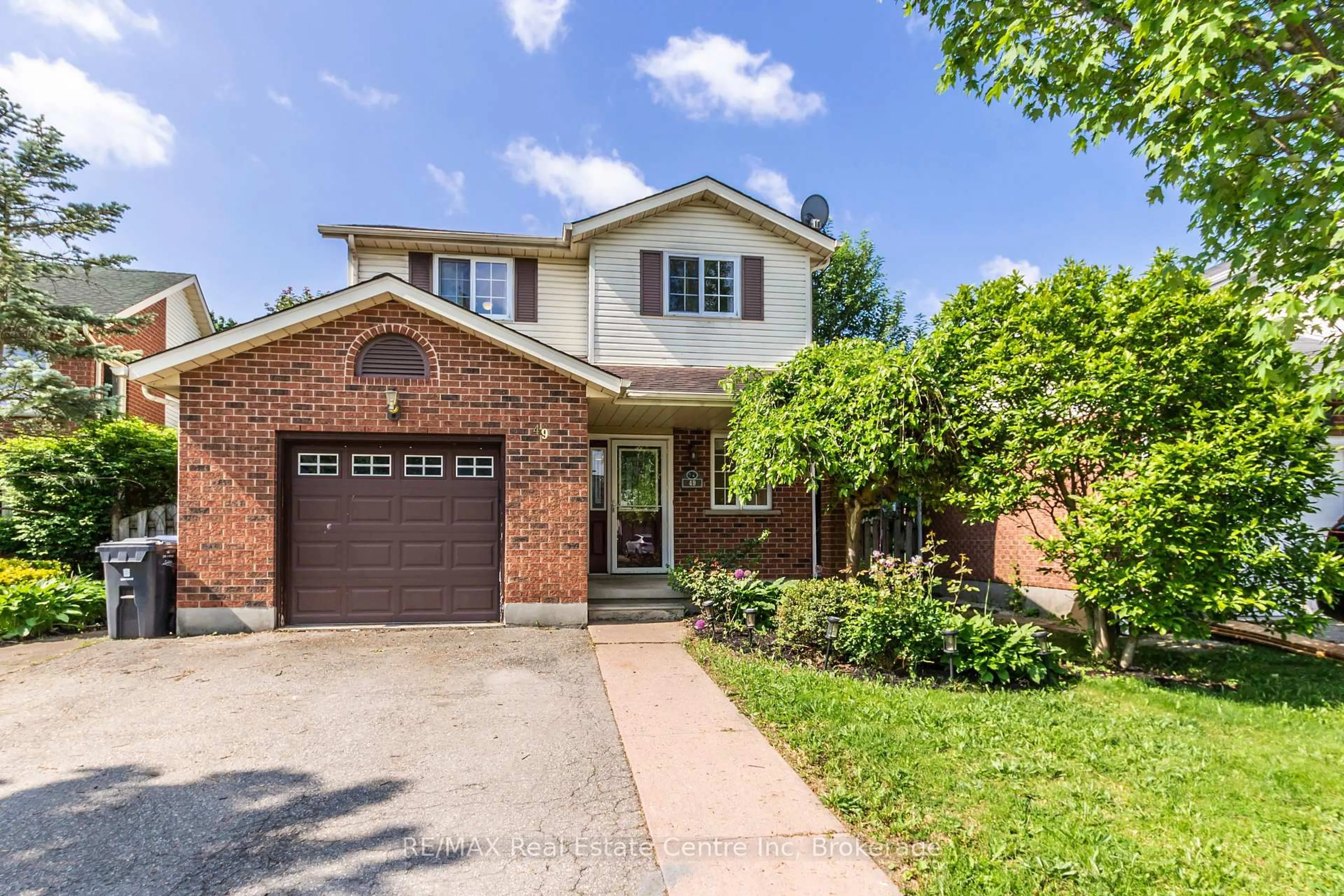 Home with brick exterior material, street for 49 Watt St, Guelph Ontario N1E 6W7