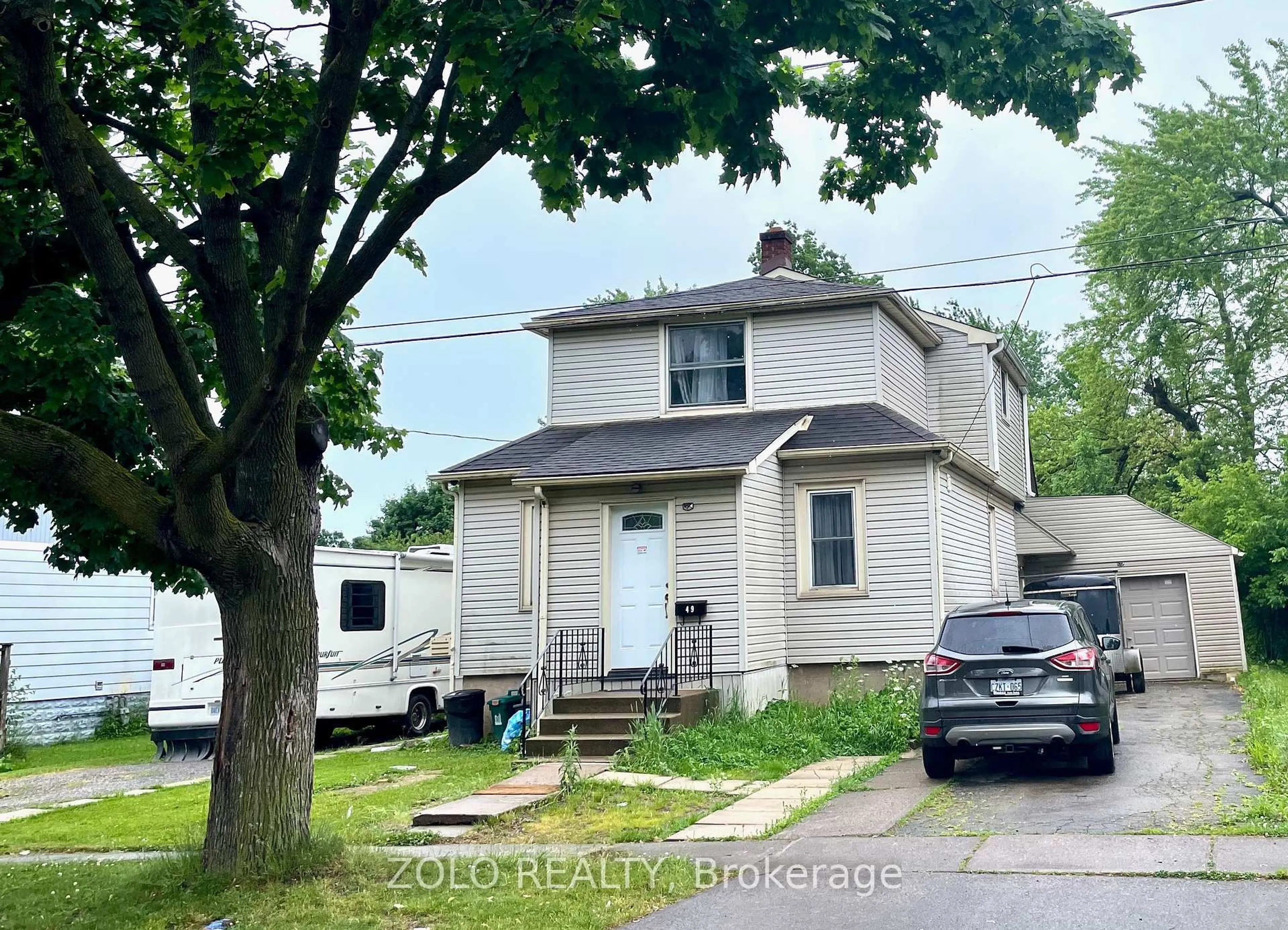 A pic from outside/outdoor area/front of a property/back of a property/a pic from drone, street for 49 Cohoe St, Welland Ontario L3B 3V2