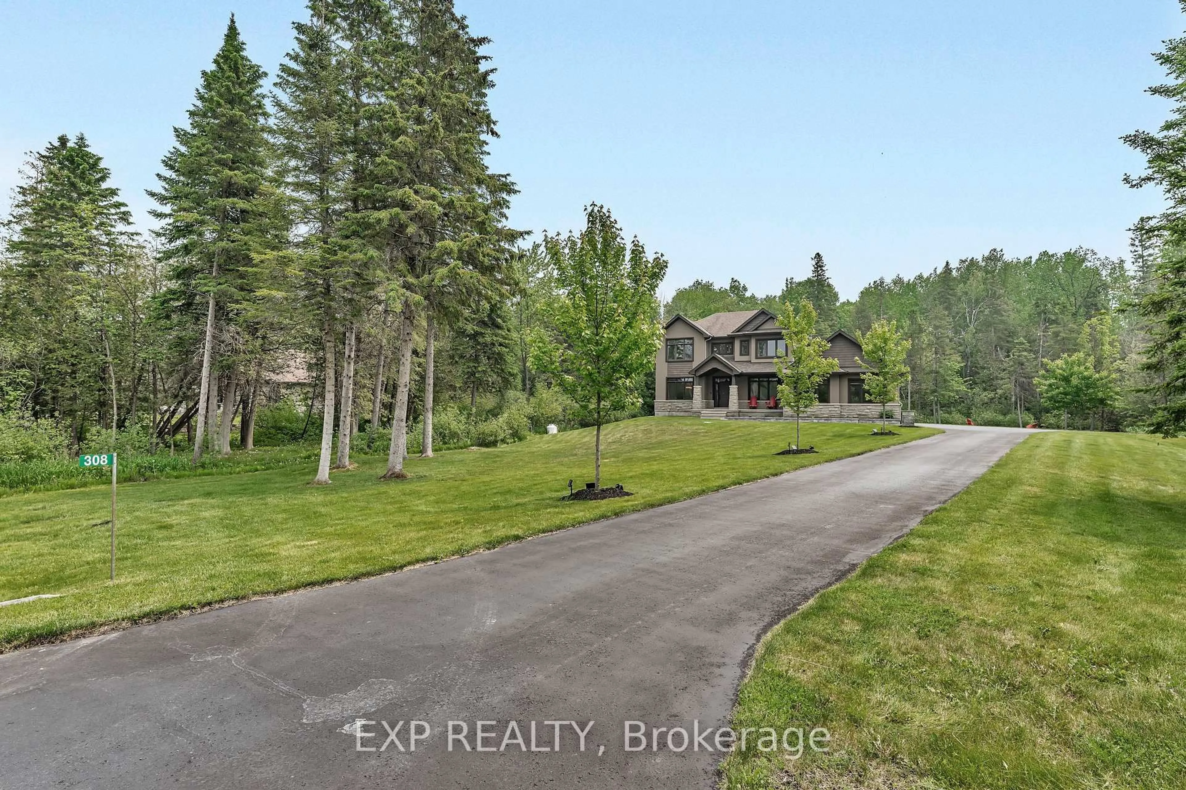 A pic from outside/outdoor area/front of a property/back of a property/a pic from drone, unknown for 308 Silent Wood Grve, Carp Ontario K0A 1L0