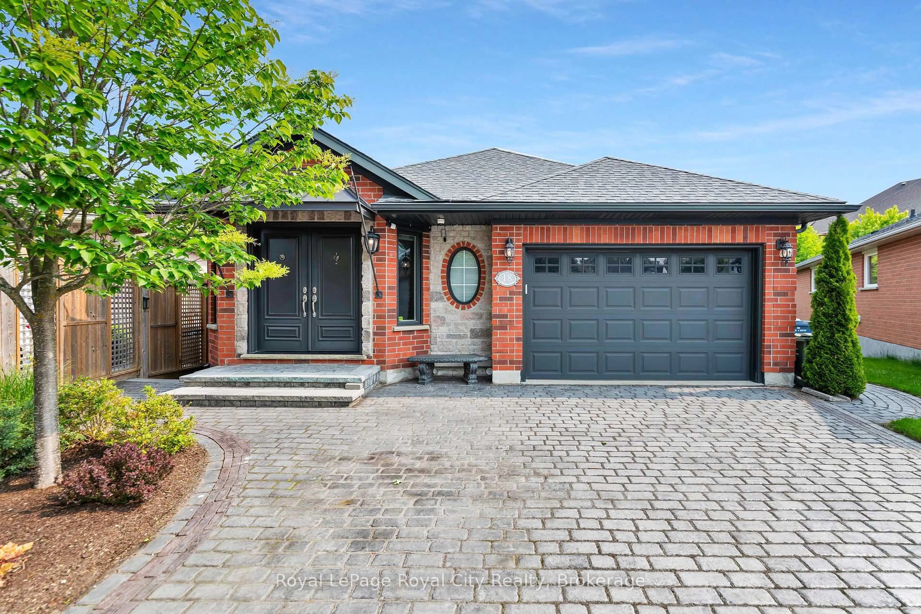 Home with brick exterior material, street for 18 Whitetail Crt, Guelph Ontario N1L 1H6
