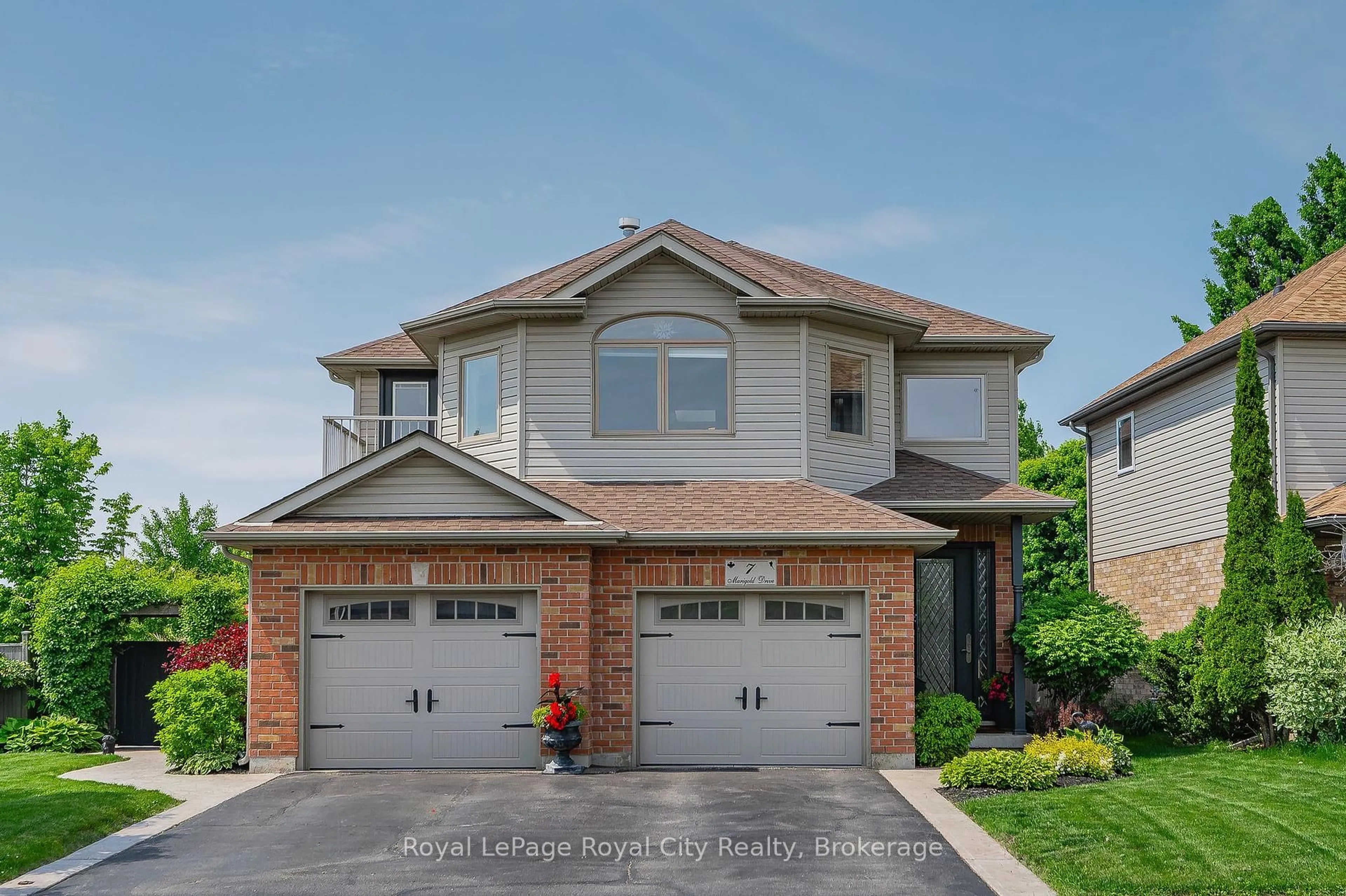 Home with brick exterior material, street for 7 Marigold Dr, Guelph Ontario N1C 1G5