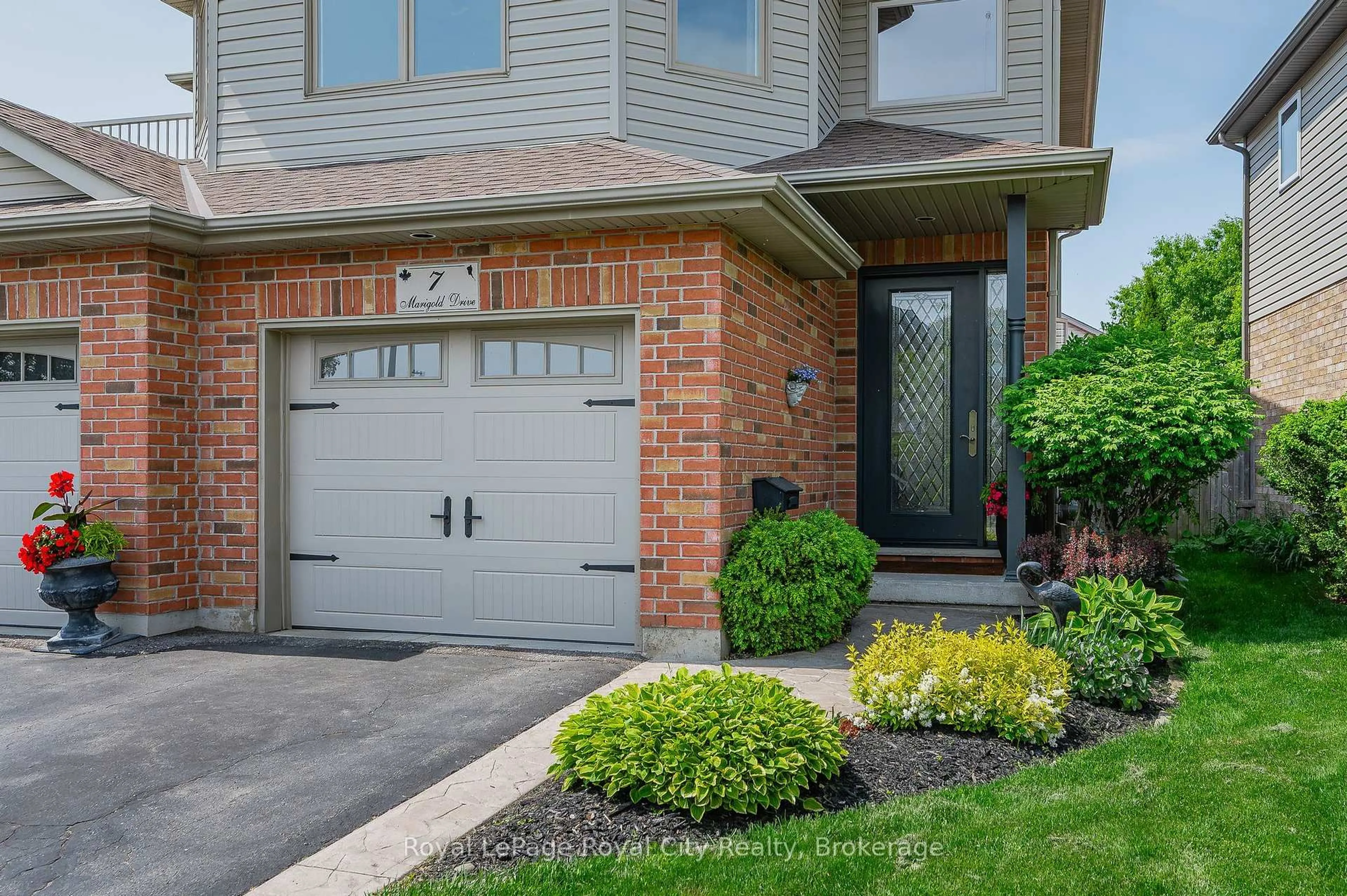 Home with brick exterior material, street for 7 Marigold Dr, Guelph Ontario N1C 1G5