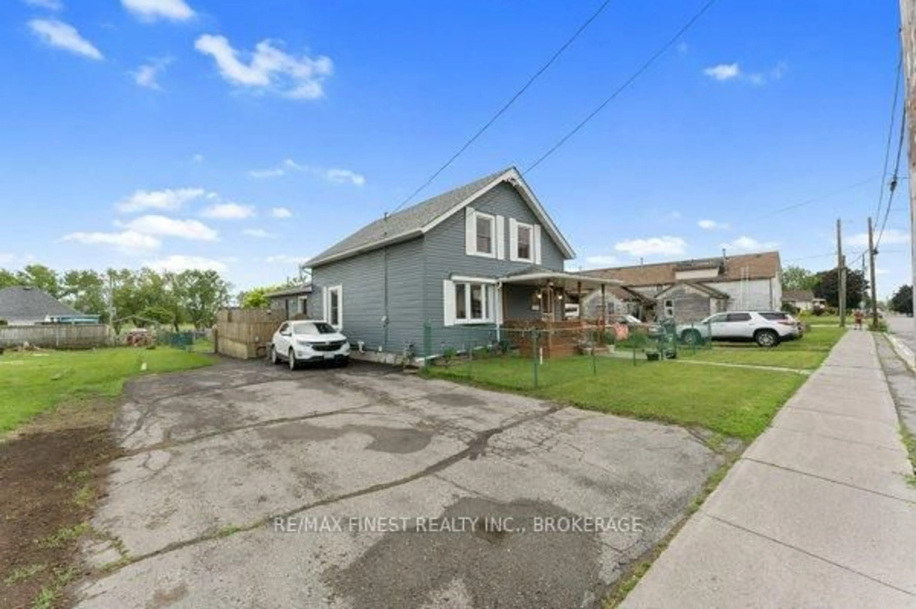 A pic from outside/outdoor area/front of a property/back of a property/a pic from drone, street for 61 John St, Quinte West Ontario K8V 1J8