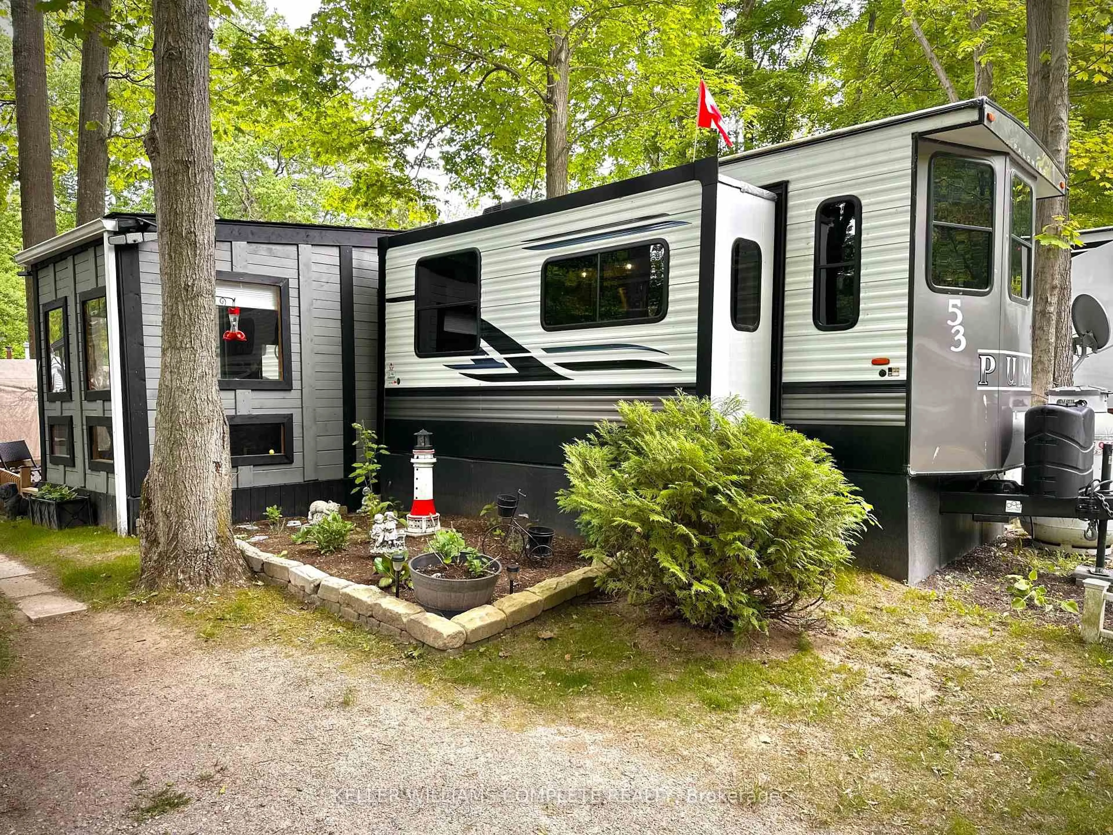 Home with vinyl exterior material, forest/trees view for 334 Rattlesnake Rd #53, Haldimand Ontario N0A 1K0