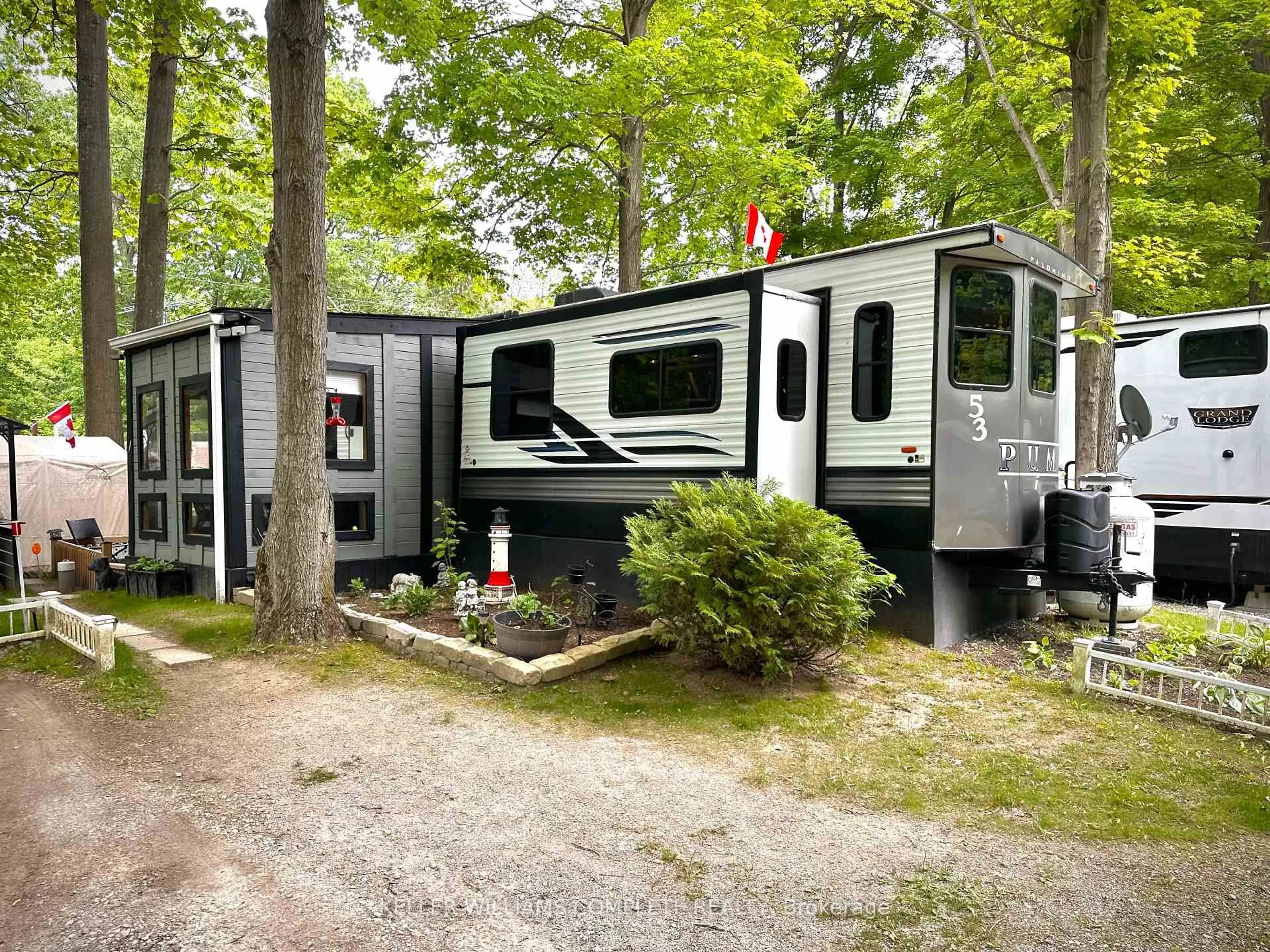 Home with vinyl exterior material, forest/trees view for 334 Rattlesnake Rd #53, Haldimand Ontario N0A 1K0