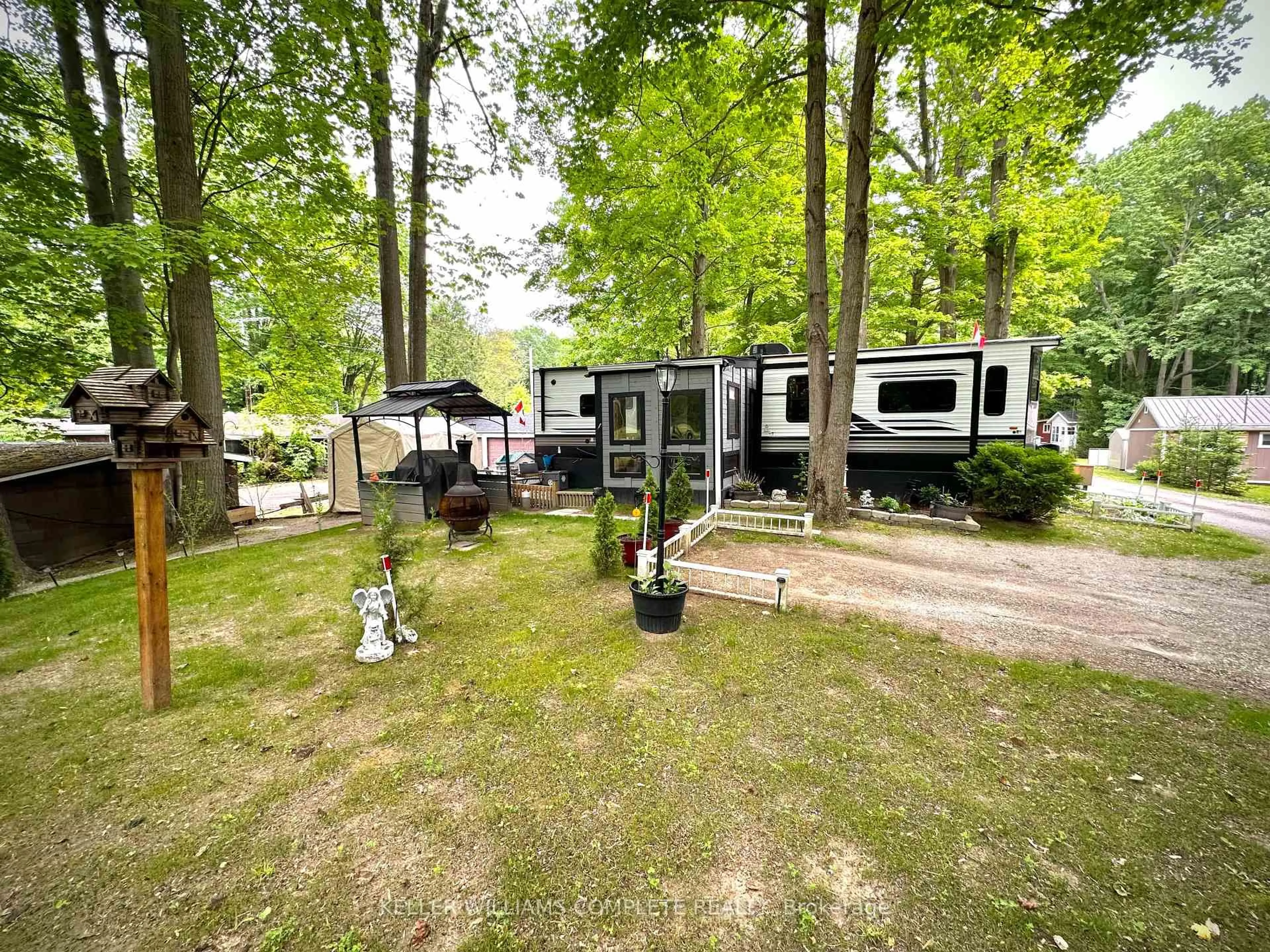 A pic from outside/outdoor area/front of a property/back of a property/a pic from drone, forest/trees view for 334 Rattlesnake Rd #53, Haldimand Ontario N0A 1K0