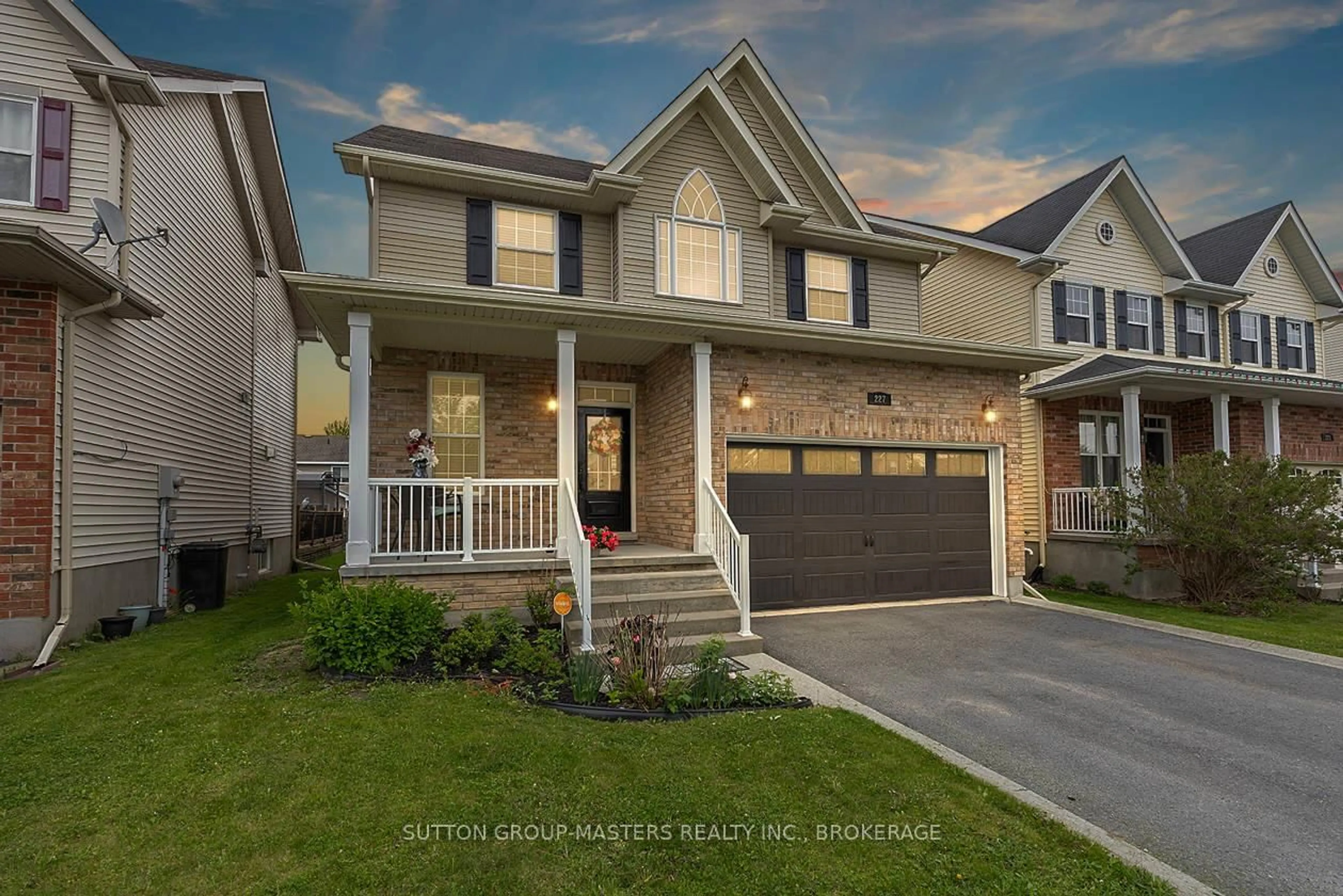 Home with brick exterior material, street for 227 Rose Abbey Dr, Kingston Ontario K7K 0A2