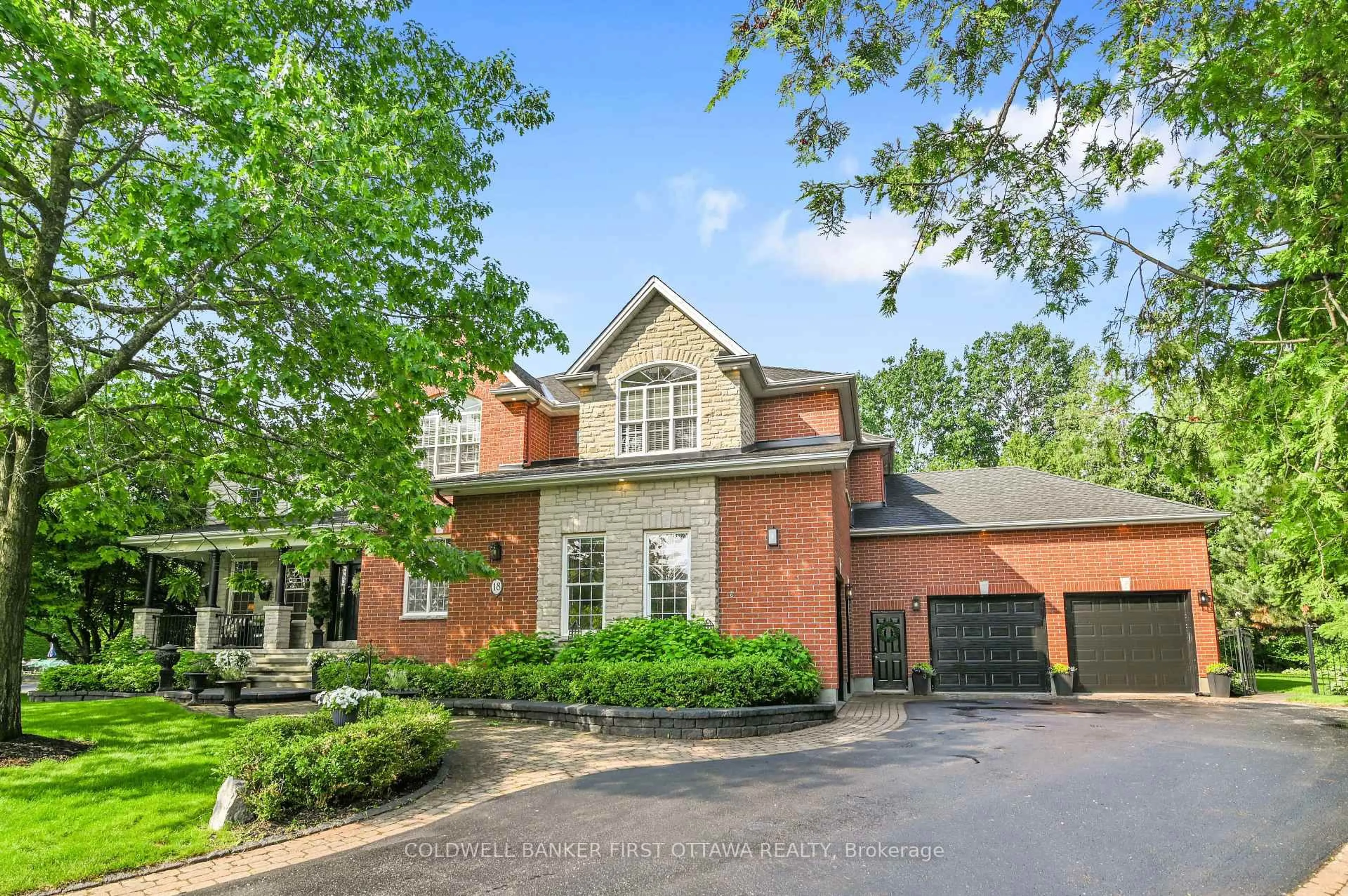 Home with brick exterior material, street for 18 CYPRESS Gdns, Stittsville Ontario K2S 1W6
