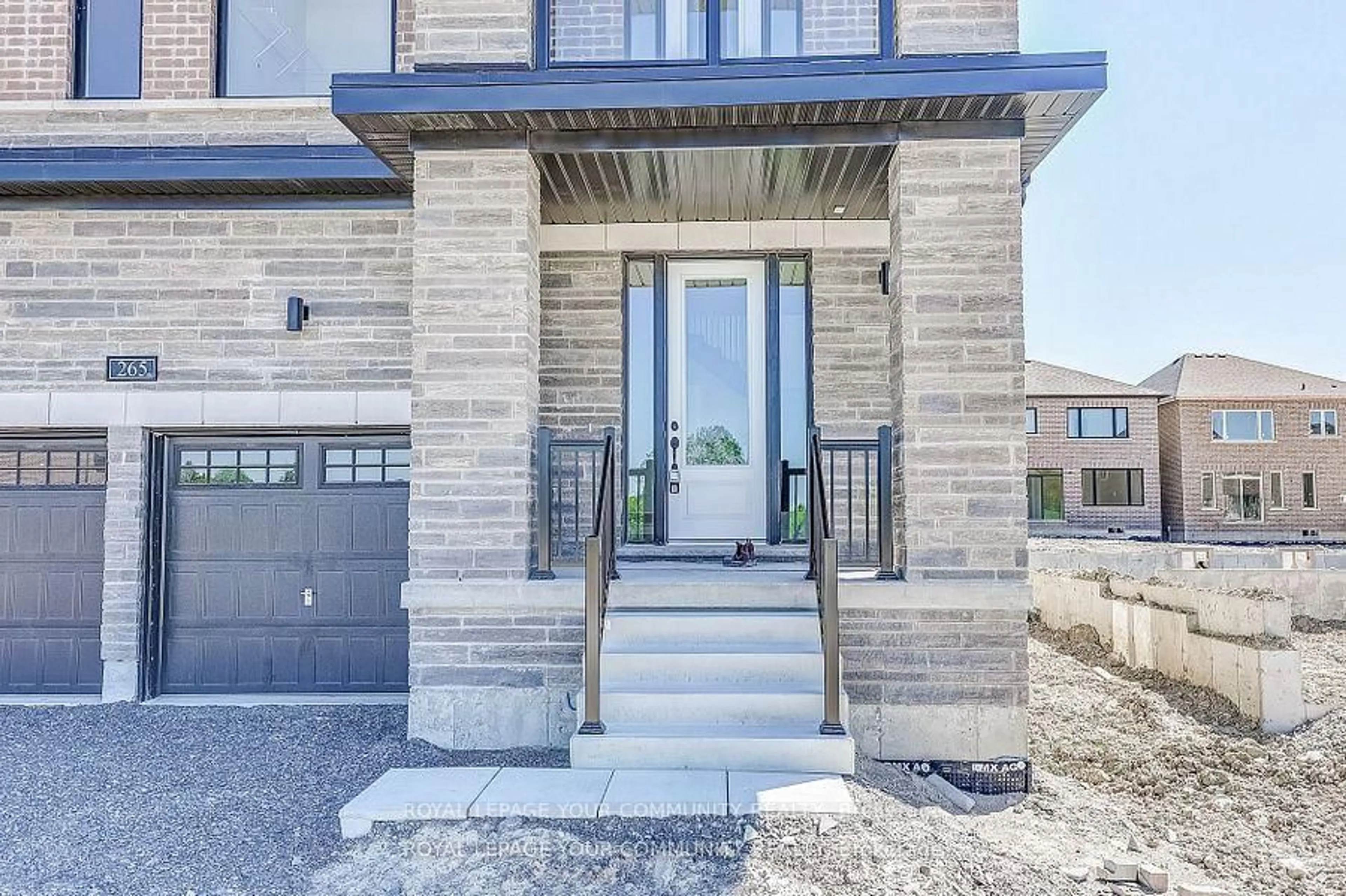 Home with brick exterior material, street for 265 Flavelle Way, Selwyn Ontario K9K 0J2