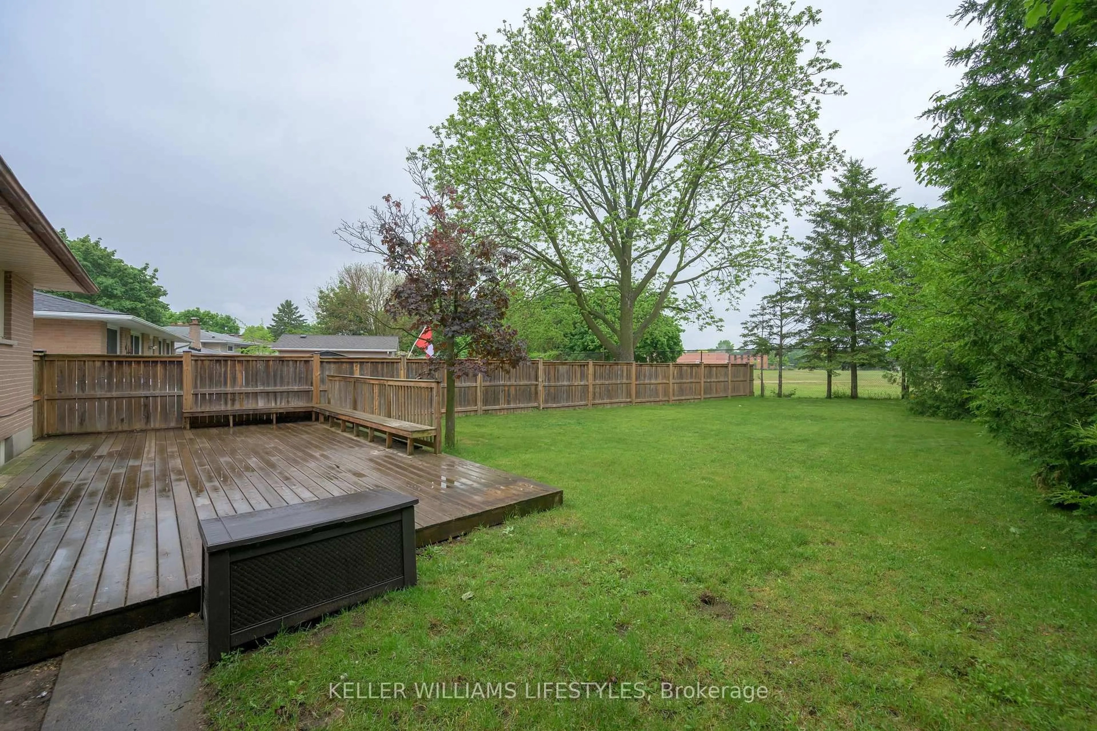 A pic from outside/outdoor area/front of a property/back of a property/a pic from drone, forest/trees view for 130 Pawnee Rd, London East Ontario N5V 2S8