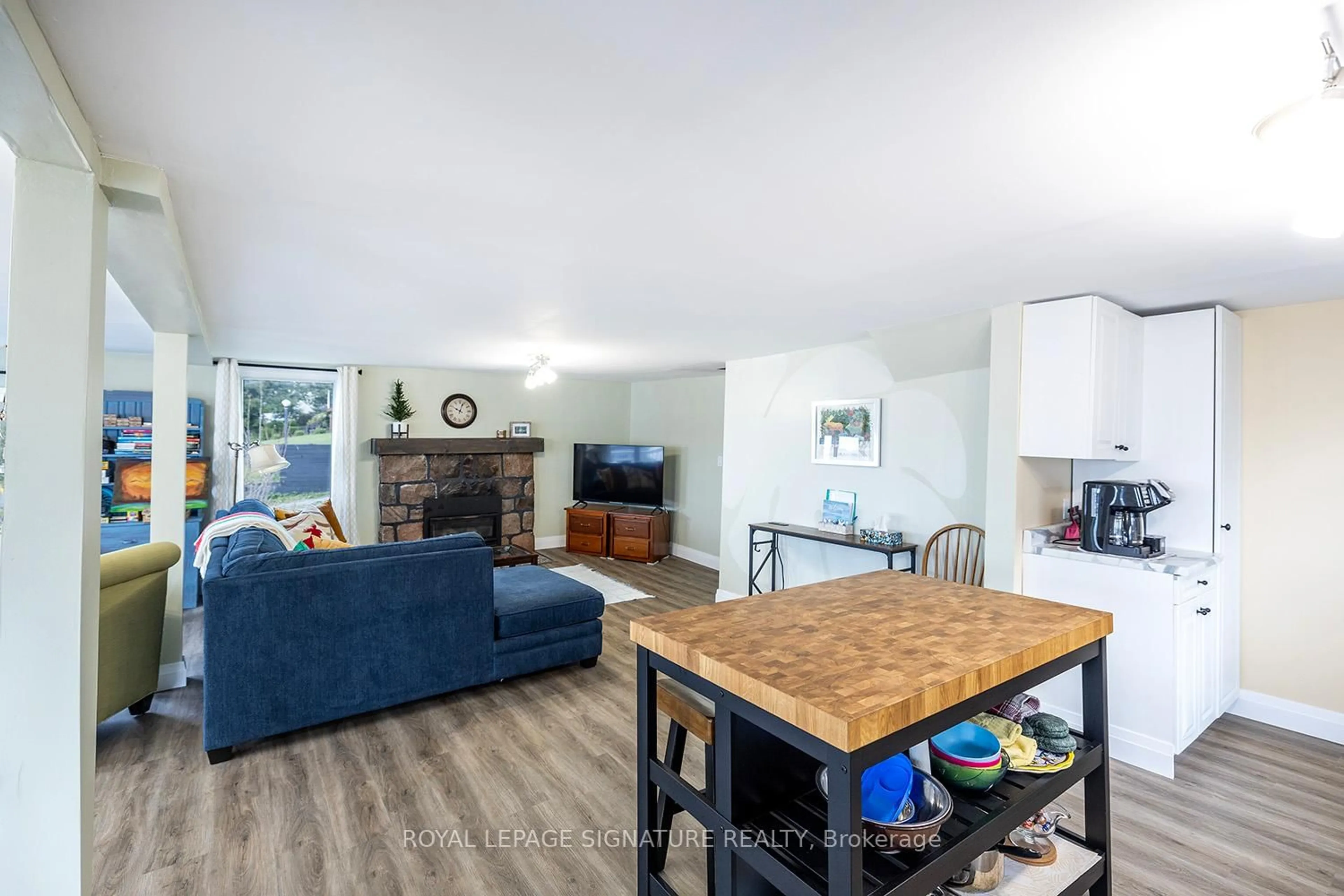 Living room with furniture, wood/laminate floor for 111 Hazel St, Kawartha Lakes Ontario K0M 1L0