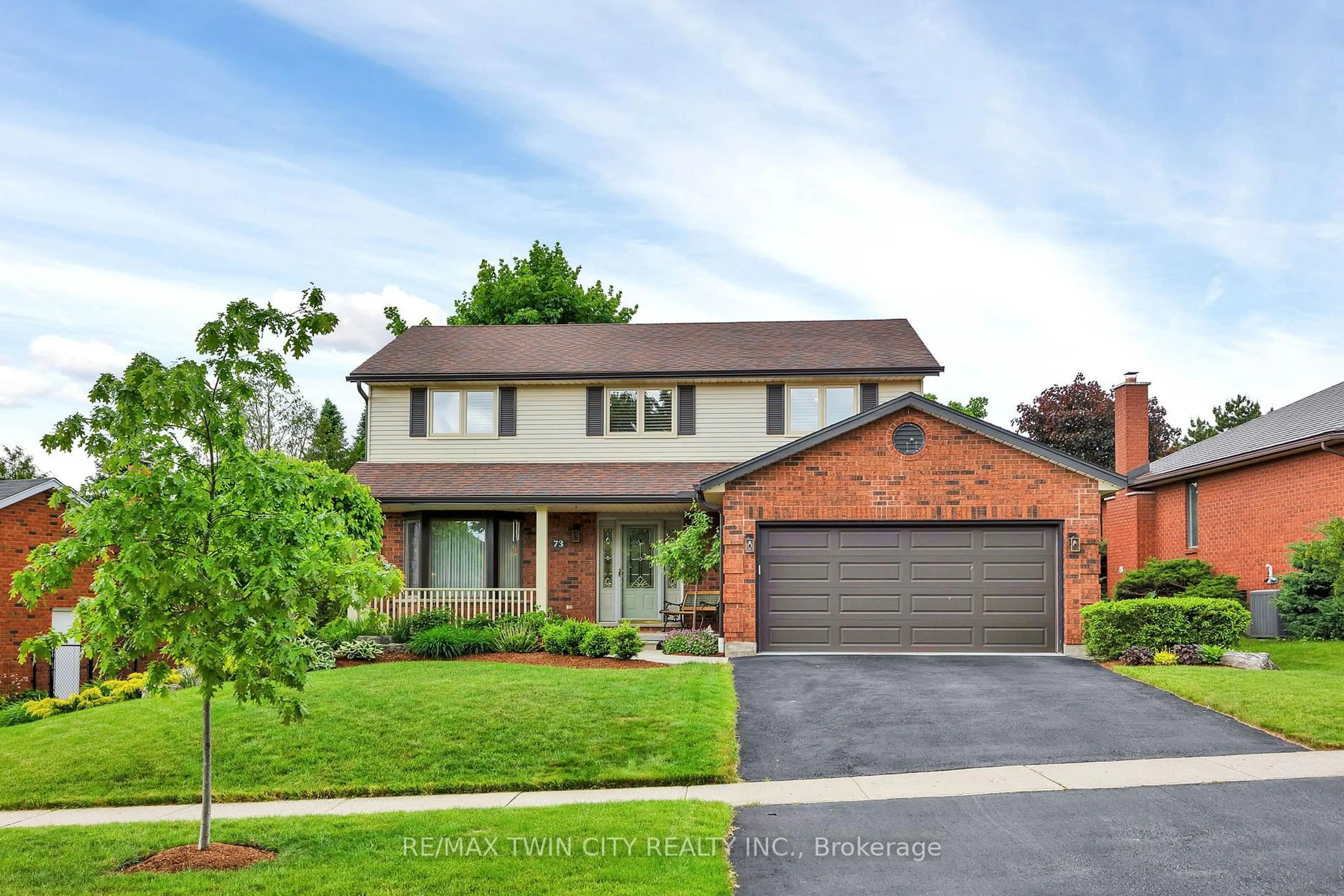 Home with brick exterior material, street for 73 Rolling Acres Dr, Kitchener Ontario N2A 3X1