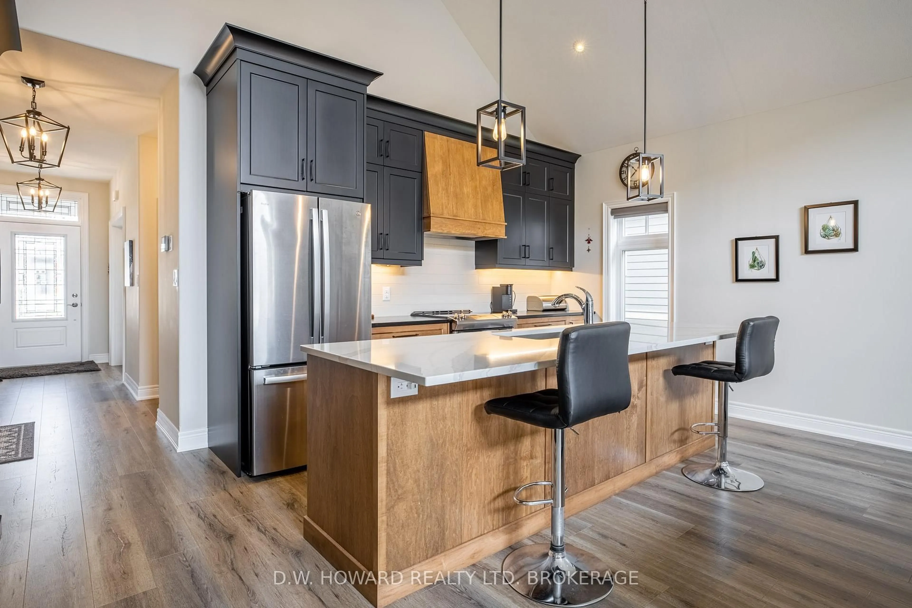 Open concept kitchen, wood/laminate floor for 8 Sassafras Row, Fort Erie Ontario L0S 1N0