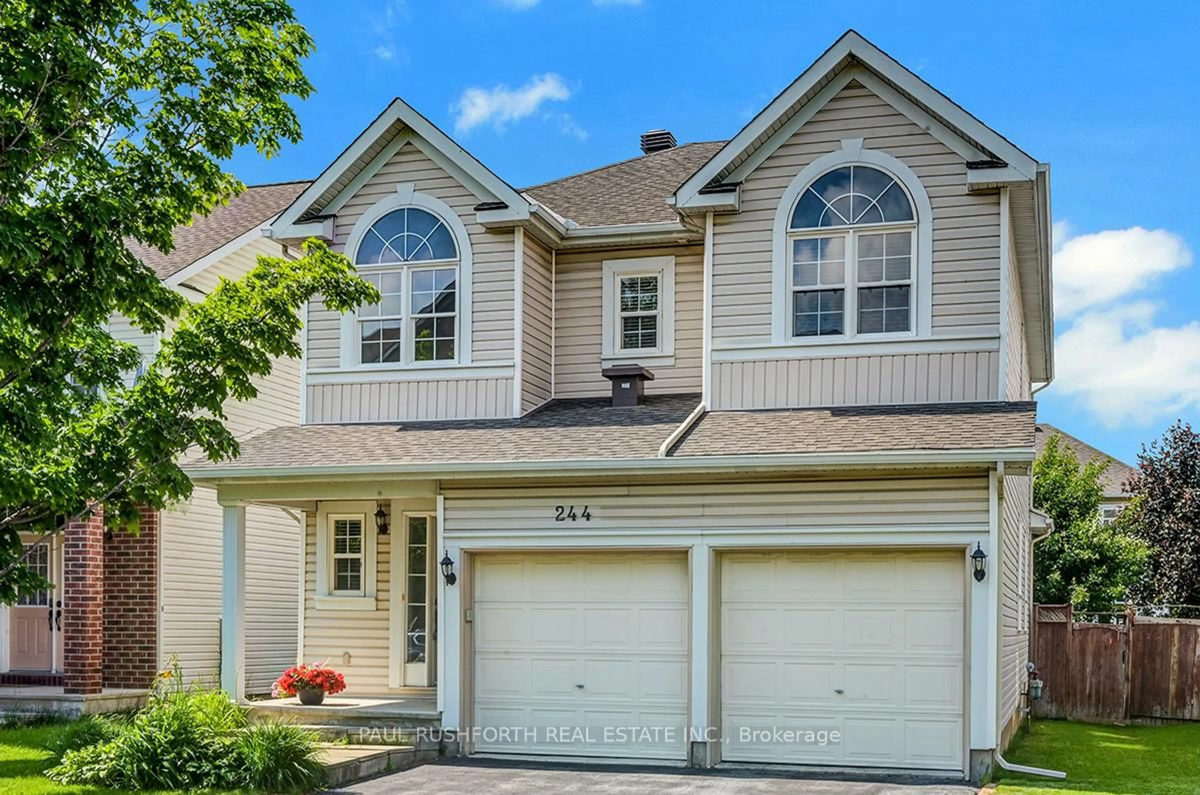 Home with vinyl exterior material, street for 244 Deercroft Ave, Ottawa Ontario K2J 5J9