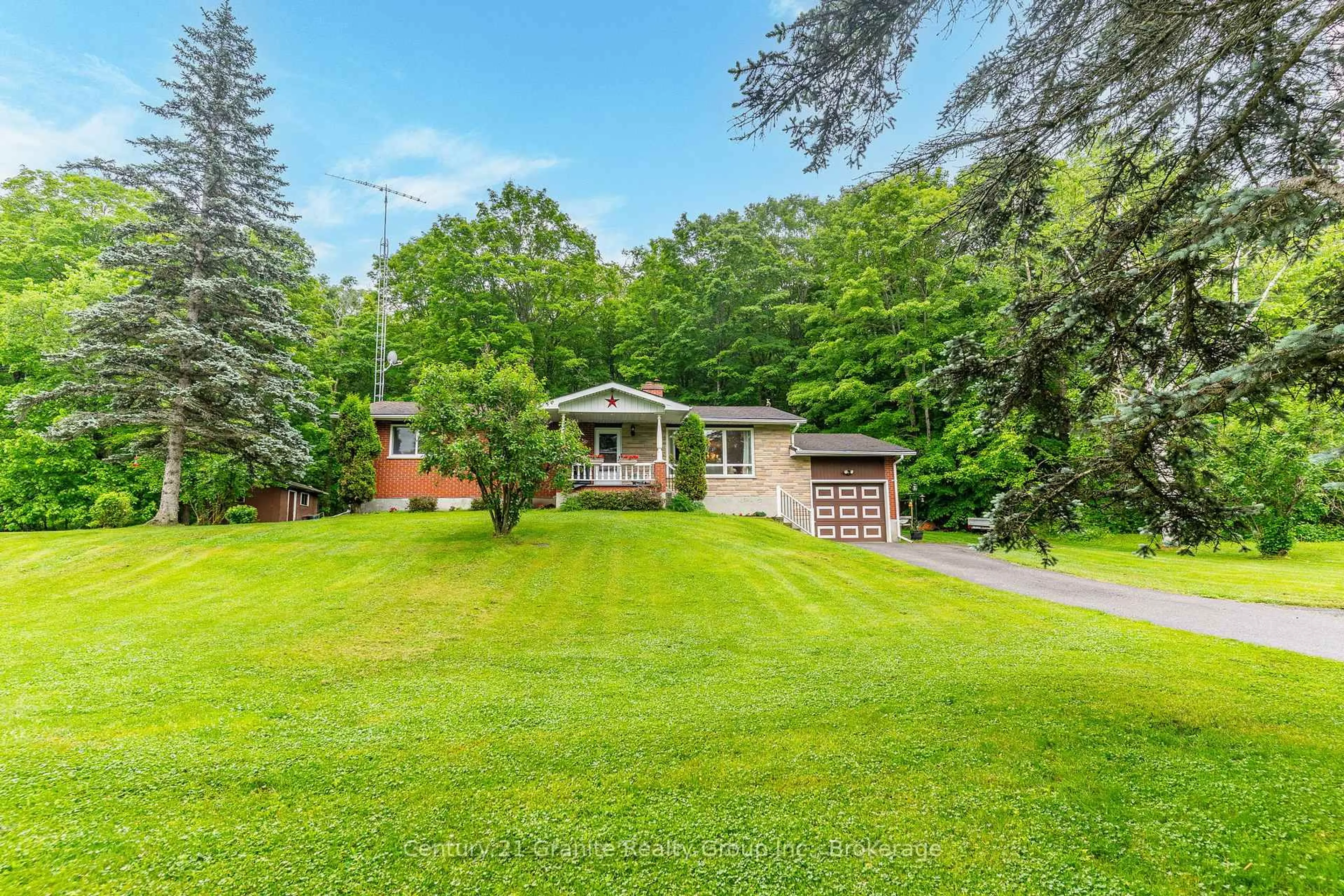A pic from outside/outdoor area/front of a property/back of a property/a pic from drone, unknown for 1203 Spring Valley Rd, Minden Hills Ontario K0M 2K0