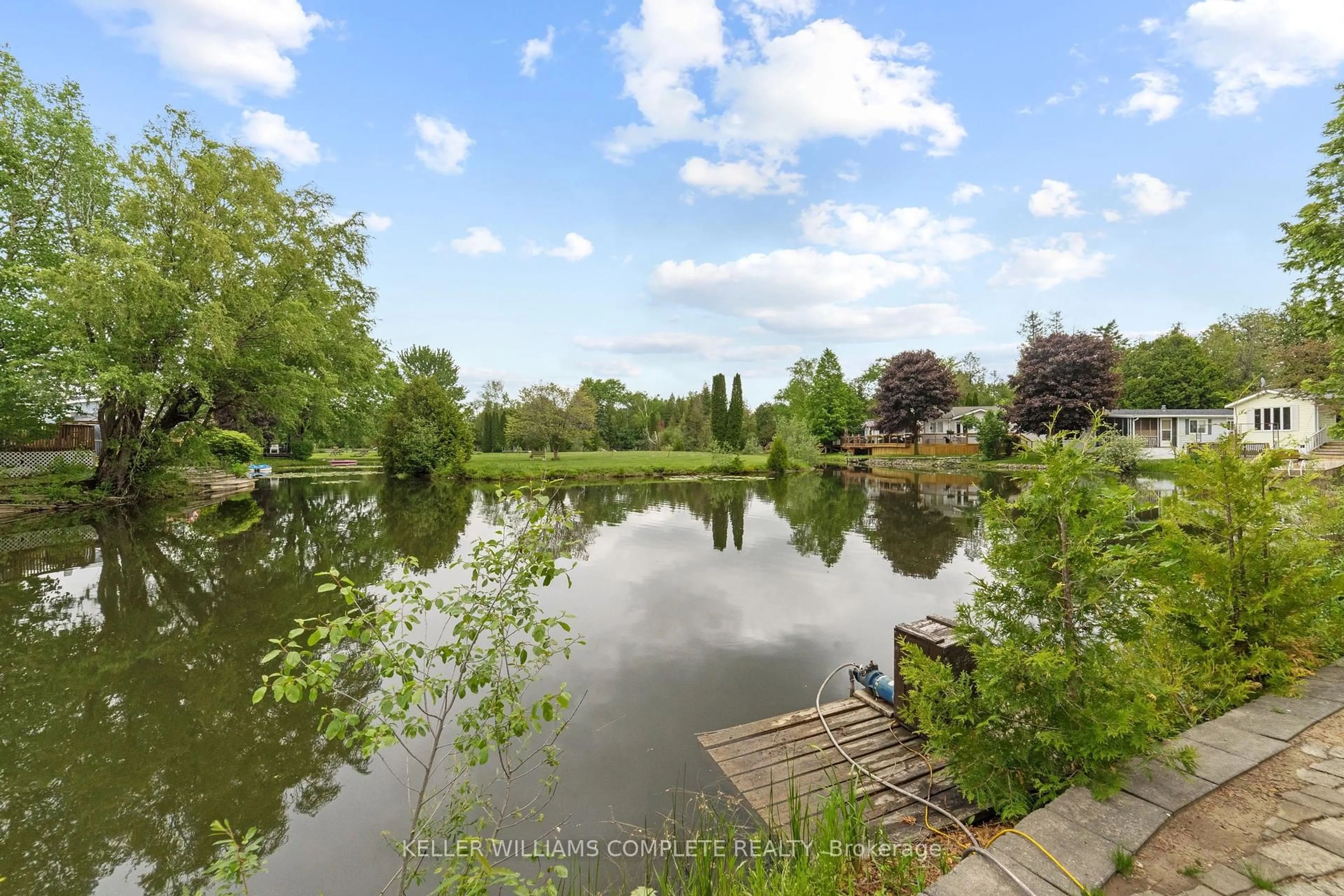 A pic from outside/outdoor area/front of a property/back of a property/a pic from drone, water/lake/river/ocean view for 16 Pine Rd, Puslinch Ontario N0B 1J0