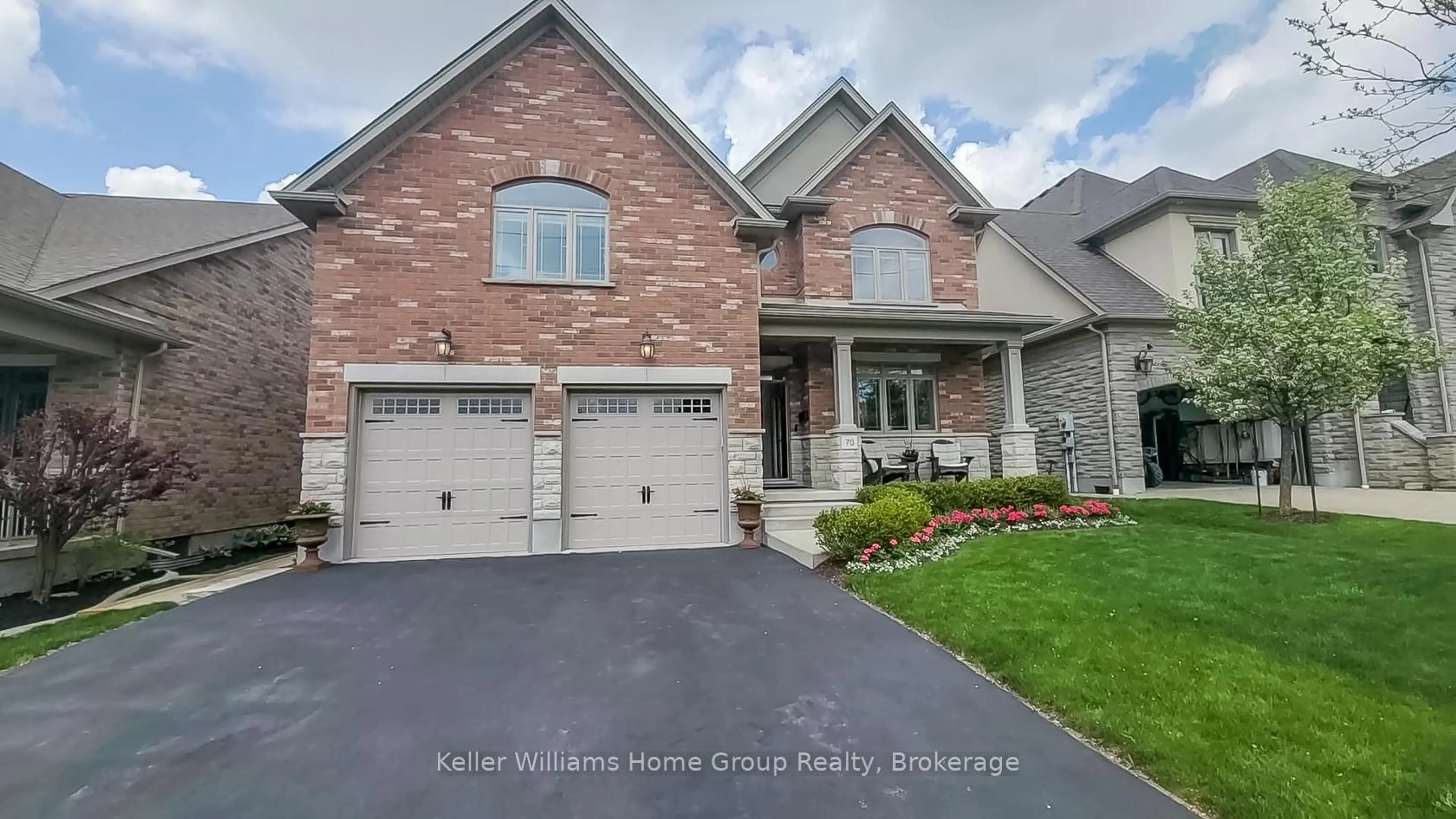 Home with brick exterior material, street for 70 Waverley Dr, Guelph Ontario N1E 6C8