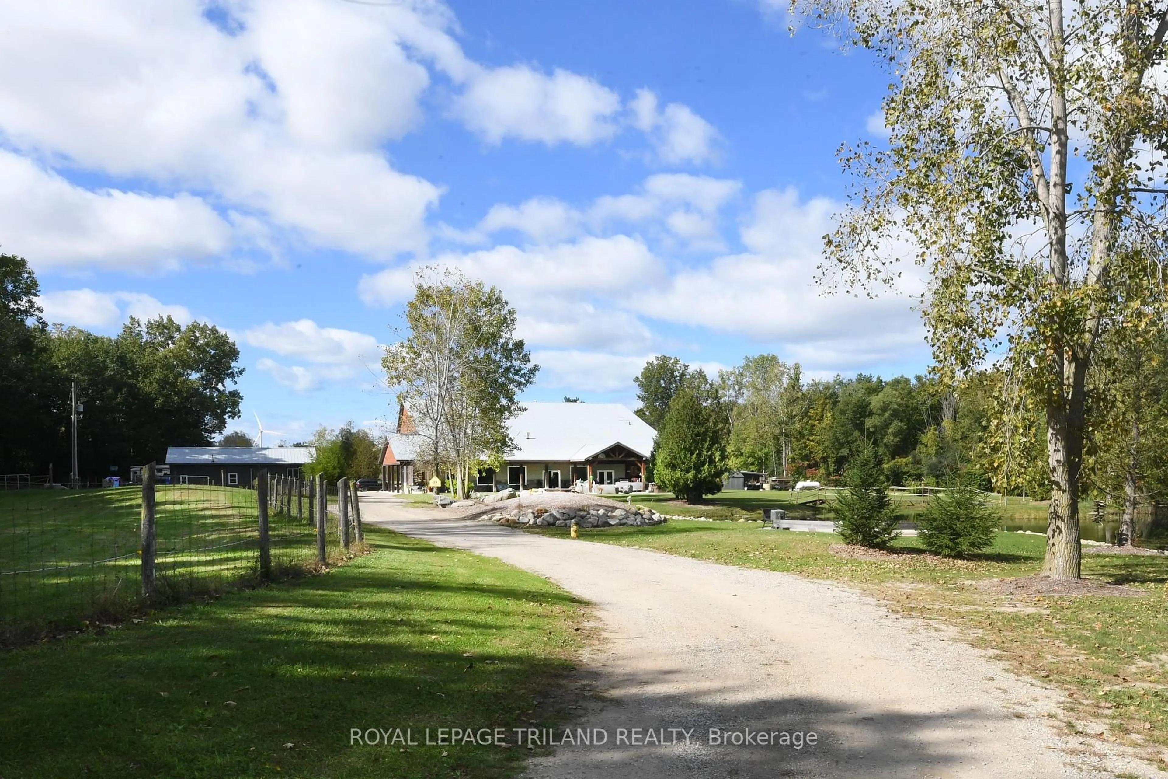 A pic from outside/outdoor area/front of a property/back of a property/a pic from drone, unknown for 7264 Ridge Rd, Lambton Shores Ontario N0N 1J3