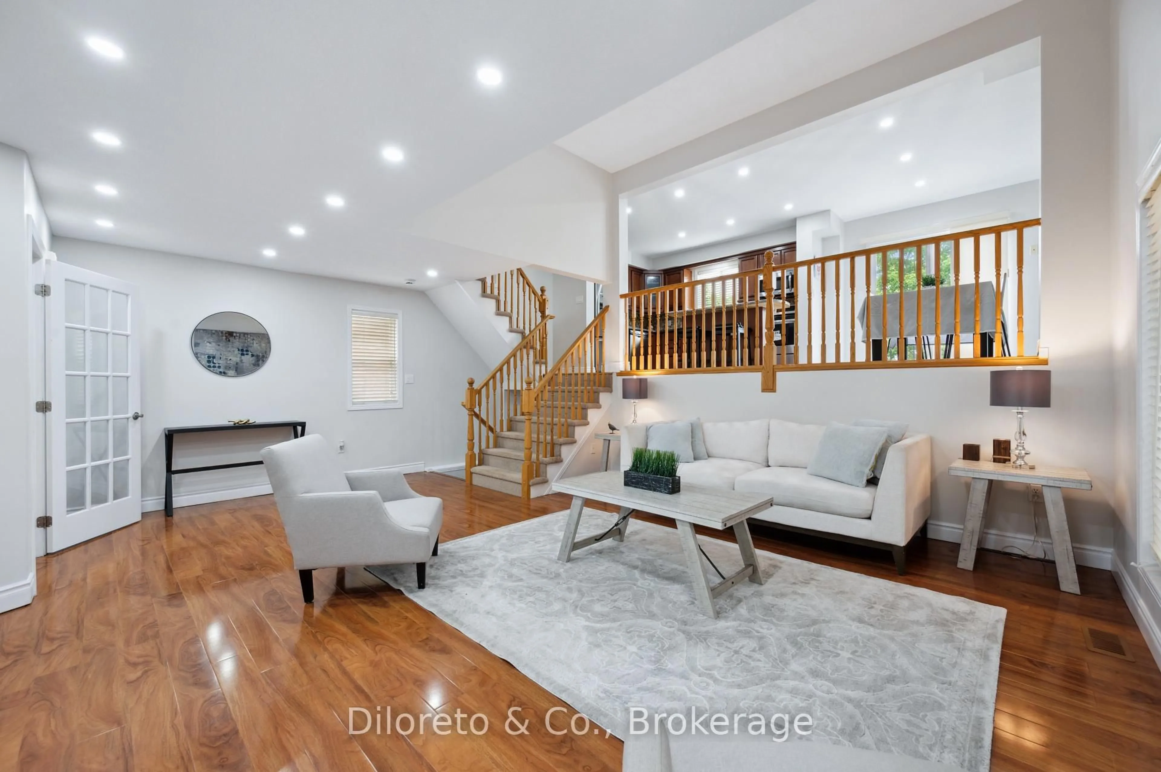 Living room with furniture, wood/laminate floor for 159 Lynch Circ, Guelph Ontario N1L 1R7