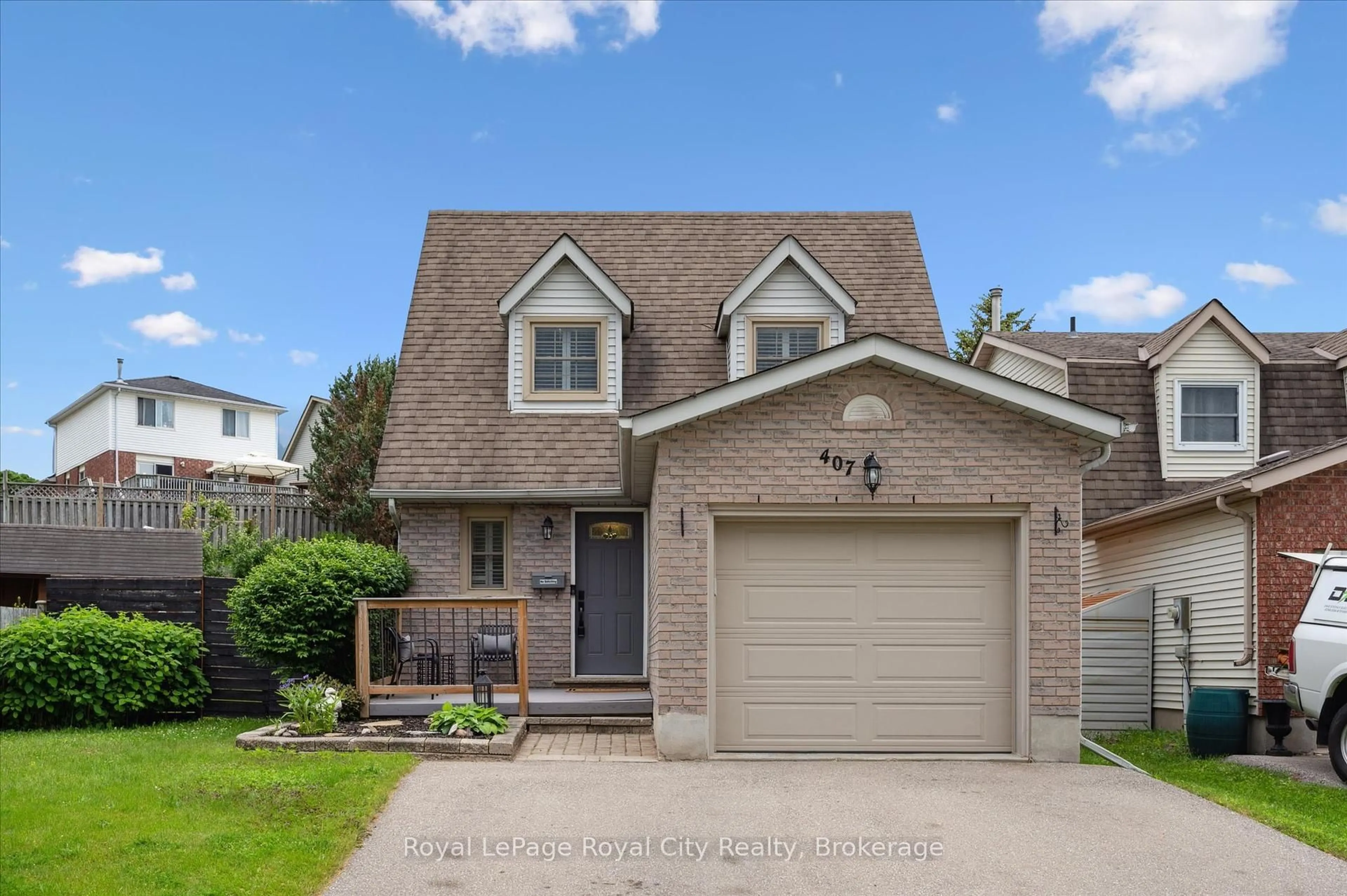 Home with brick exterior material, street for 407 Otterbein Rd, Kitchener Ontario N2B 3V8