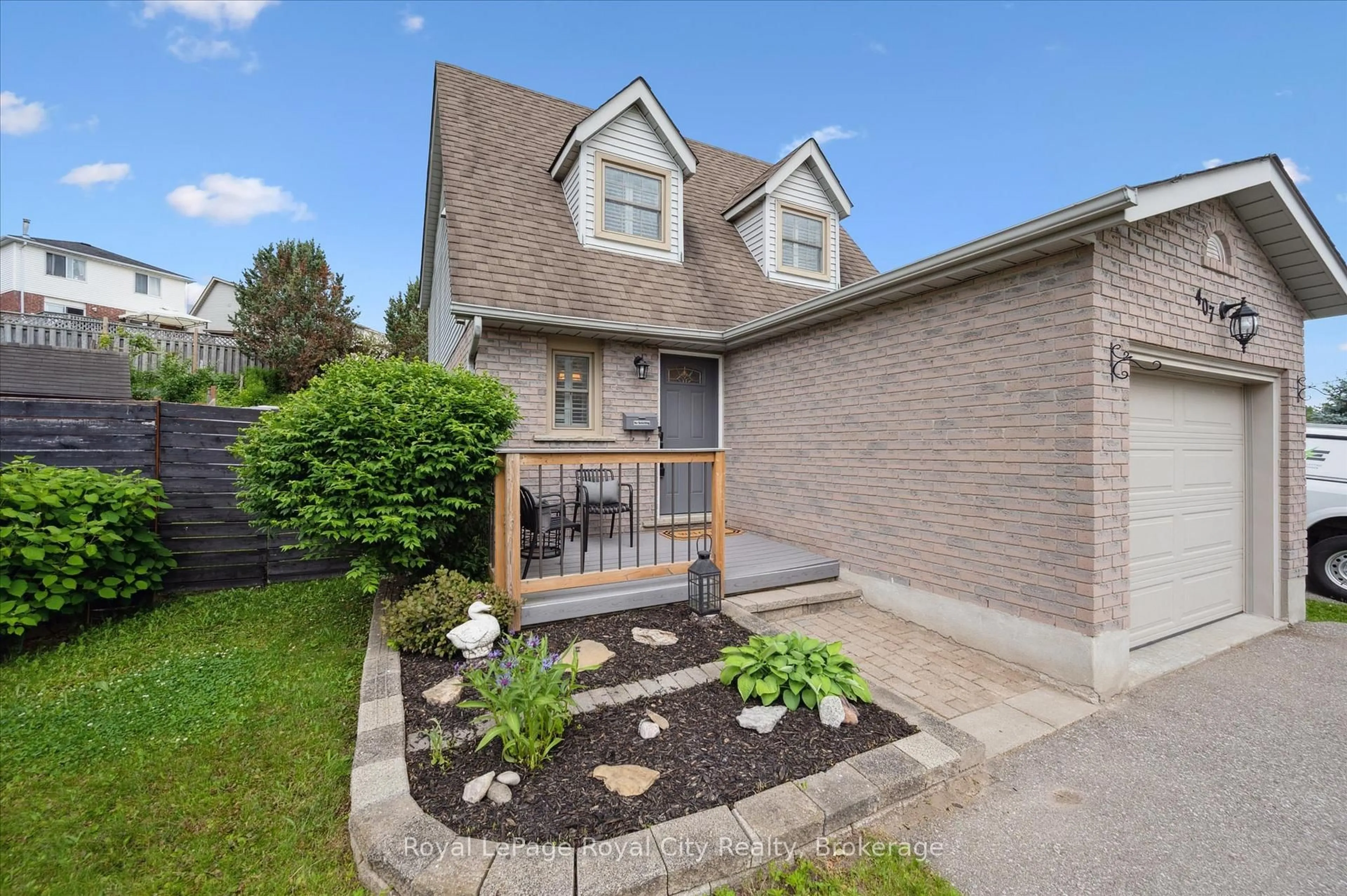 Home with brick exterior material, street for 407 Otterbein Rd, Kitchener Ontario N2B 3V8