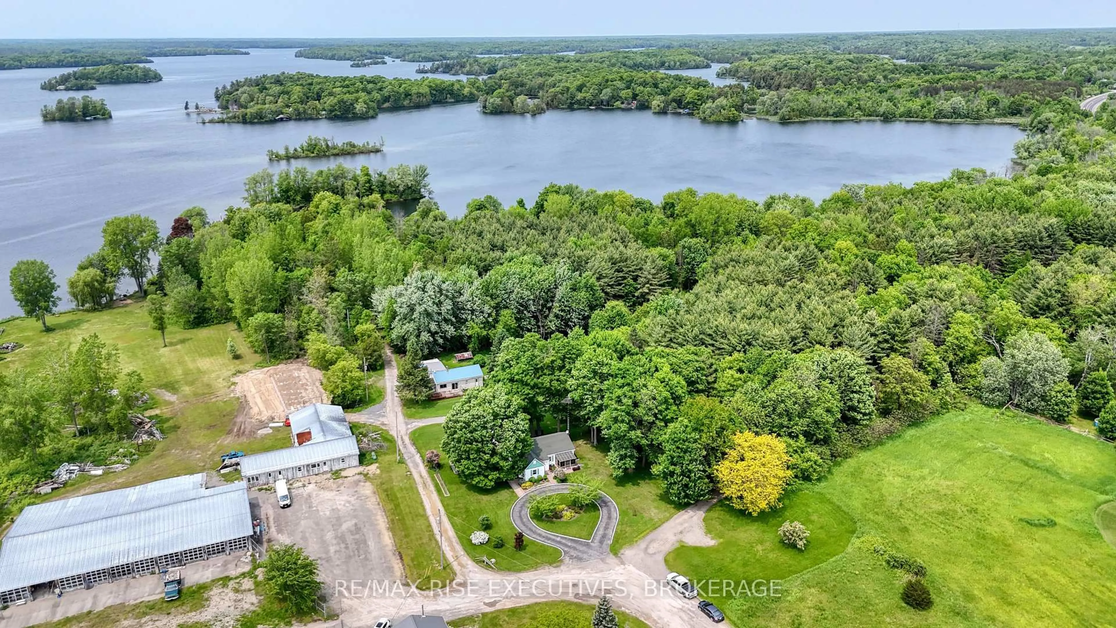 A pic from outside/outdoor area/front of a property/back of a property/a pic from drone, water/lake/river/ocean view for 204 Road 33, Rideau Lakes Ontario K0G 1V0