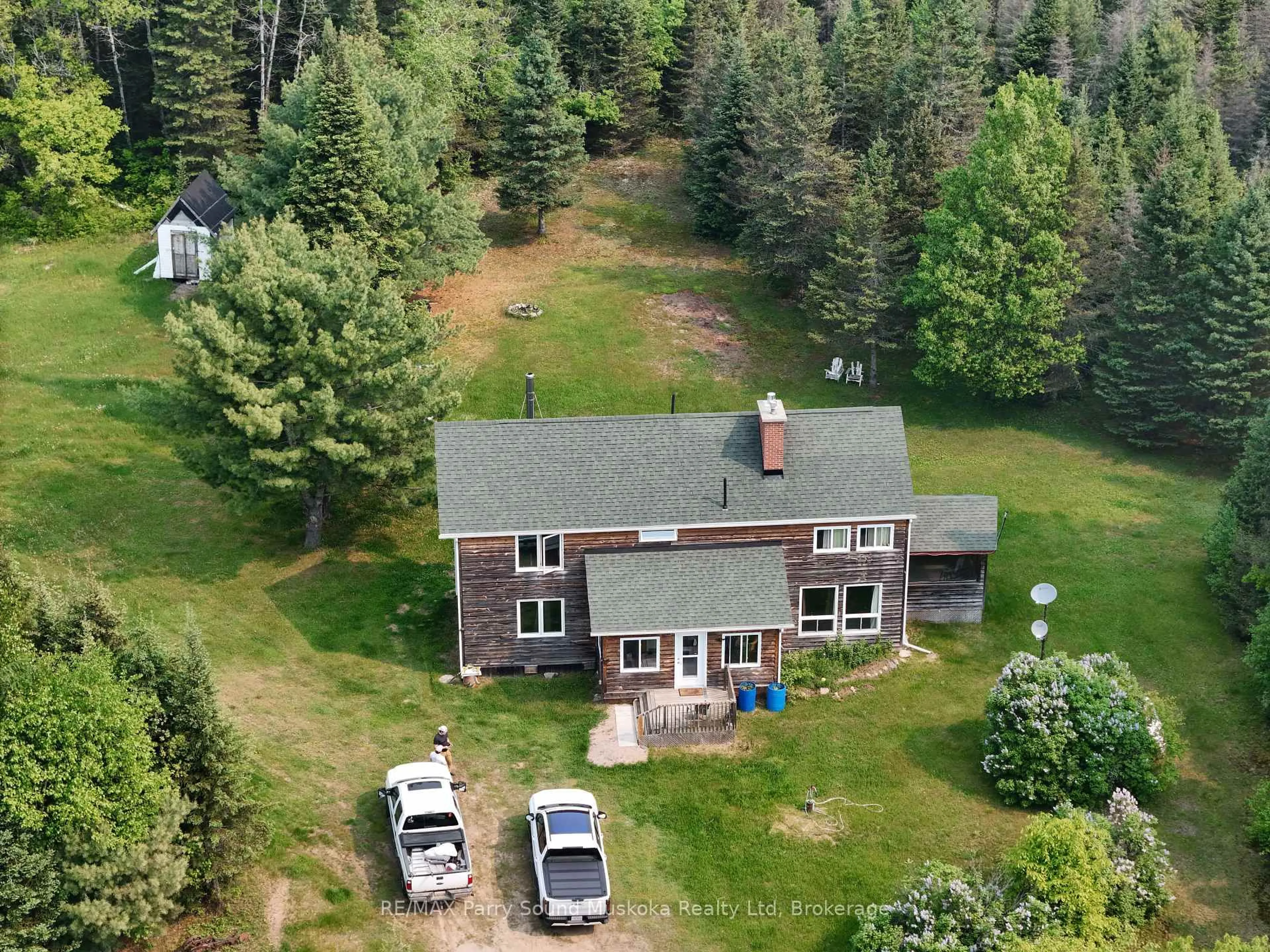 A pic from outside/outdoor area/front of a property/back of a property/a pic from drone, forest/trees view for 308 King Lake Rd, Machar Ontario P0A 1X0