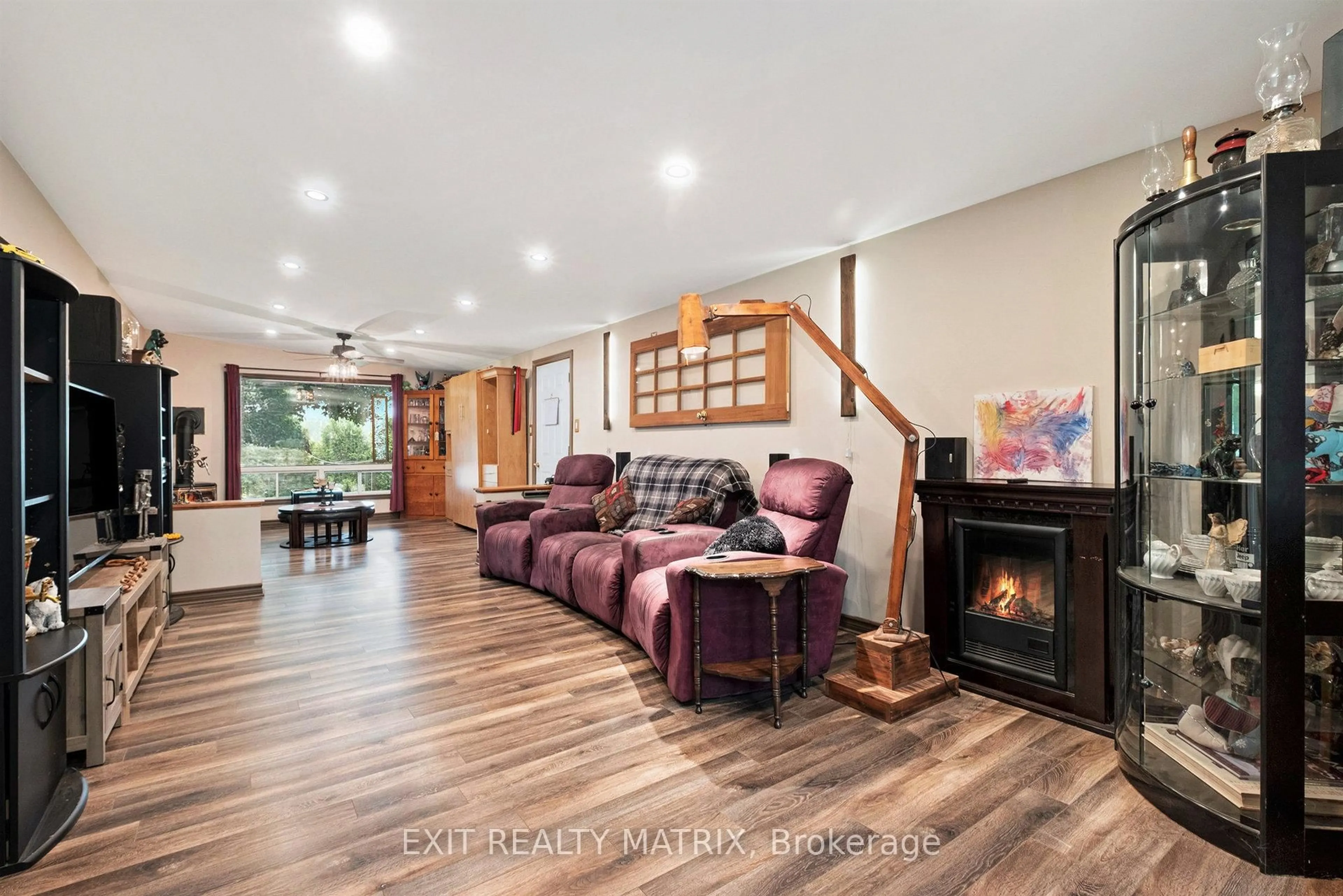 Living room with furniture, wood/laminate floor for 4866 County Road 17 Rd, Alfred and Plantagenet Ontario K0B 1A0