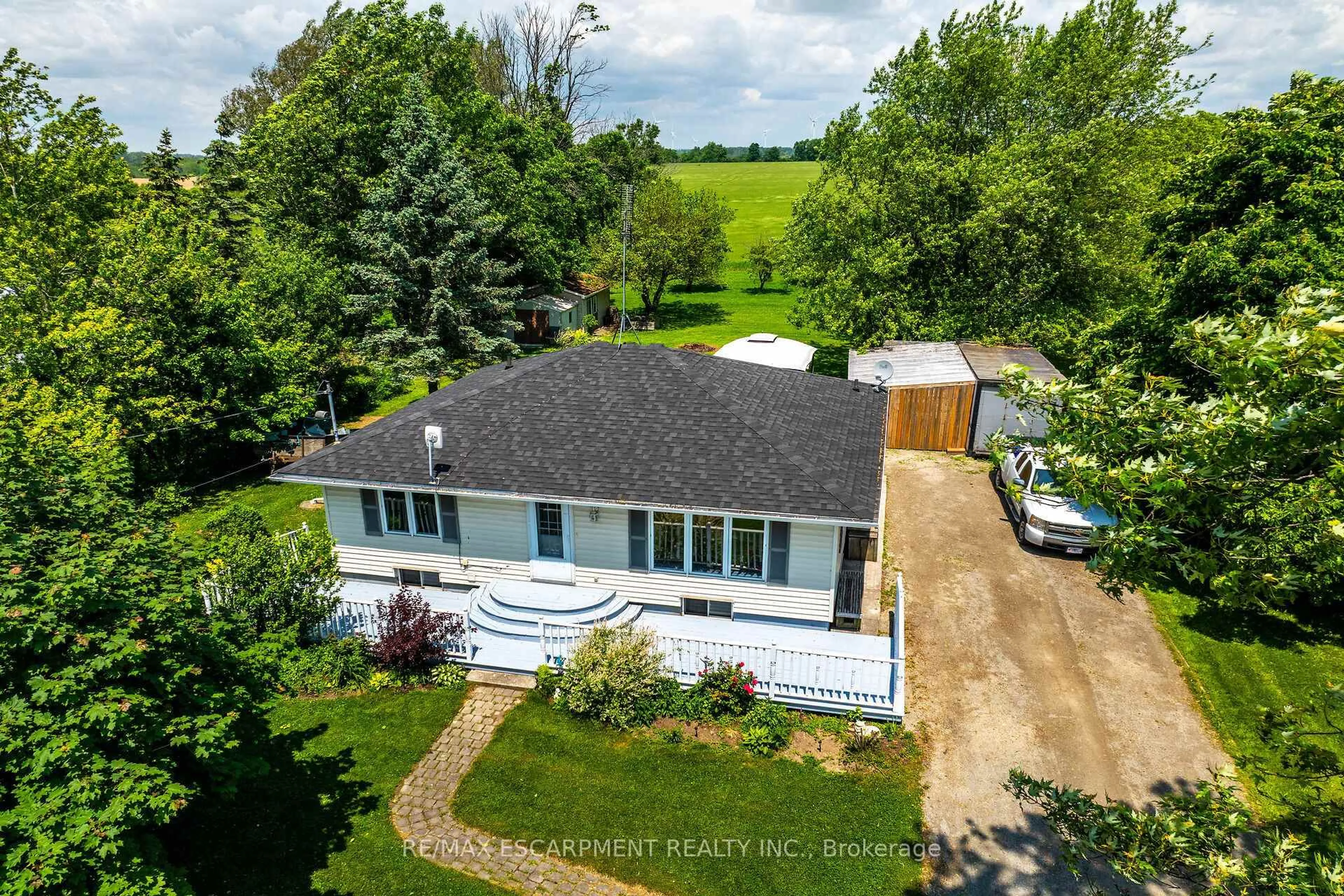 A pic from outside/outdoor area/front of a property/back of a property/a pic from drone, unknown for 151 Rainham Rd, Haldimand Ontario N0A 1L0
