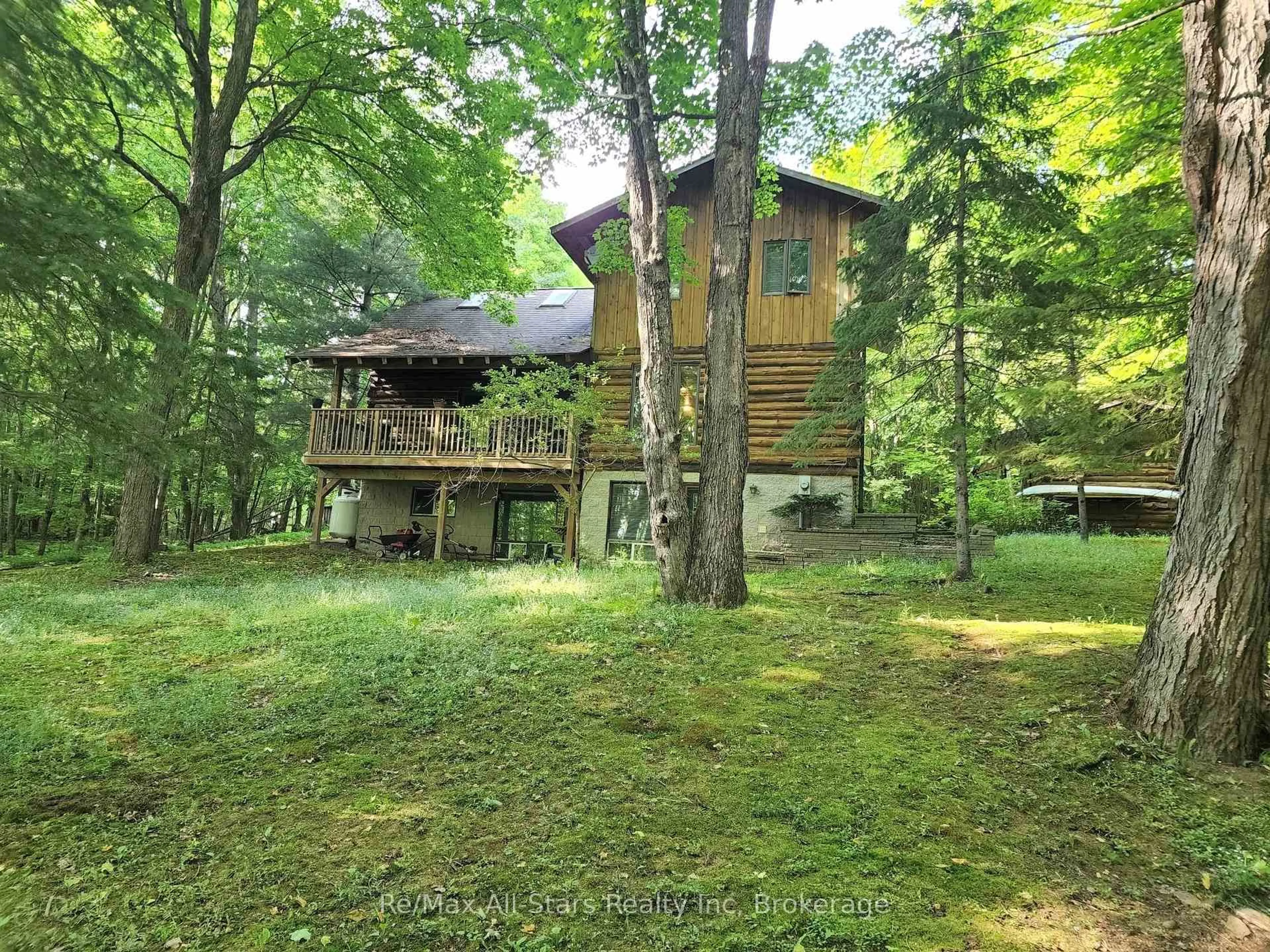 A pic from outside/outdoor area/front of a property/back of a property/a pic from drone, forest/trees view for 1386 South Portage Rd, Lake of Bays Ontario P1H 2J6