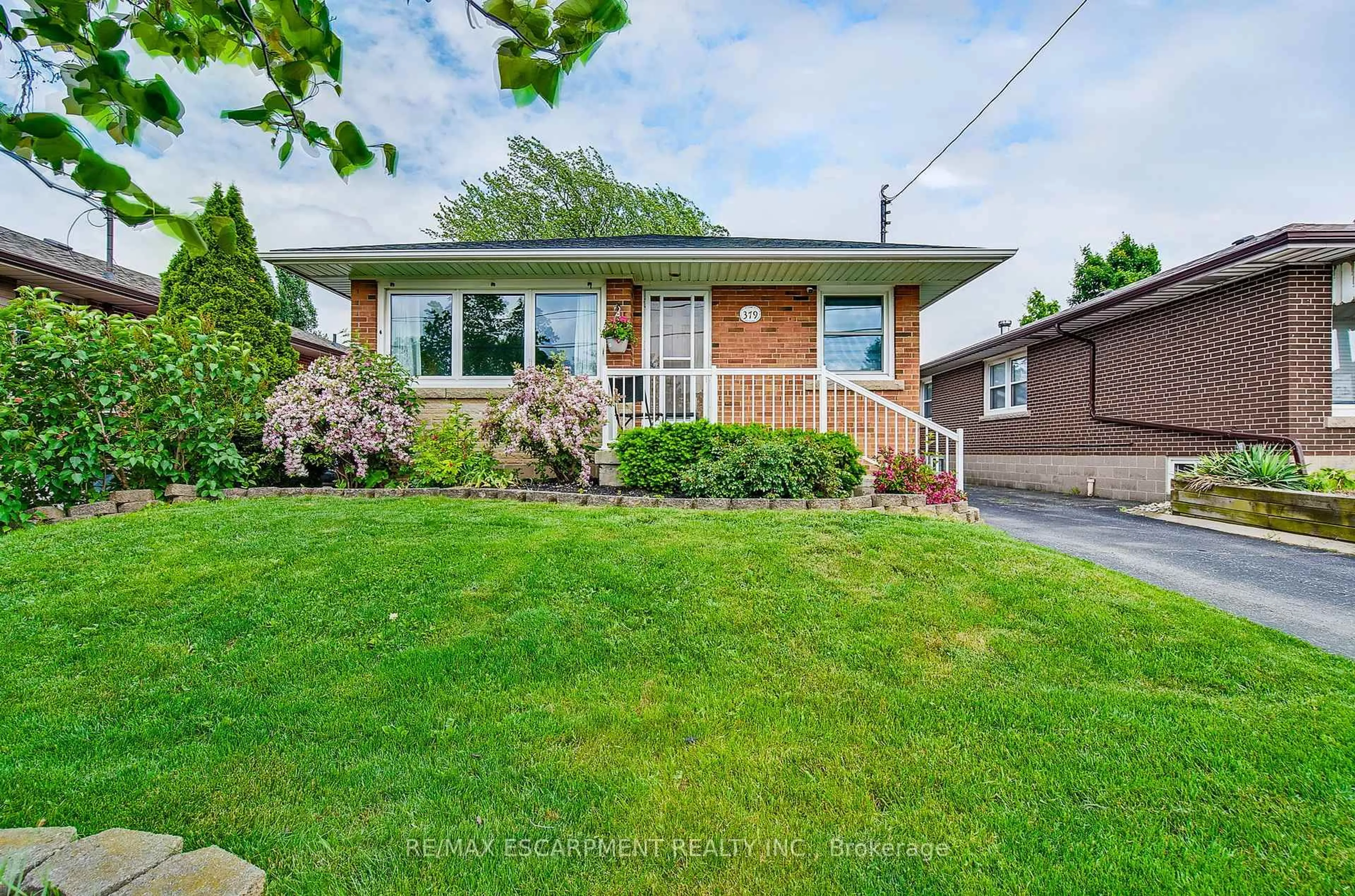 Home with brick exterior material, street for 379 East 18th St, Hamilton Ontario L9A 4P7