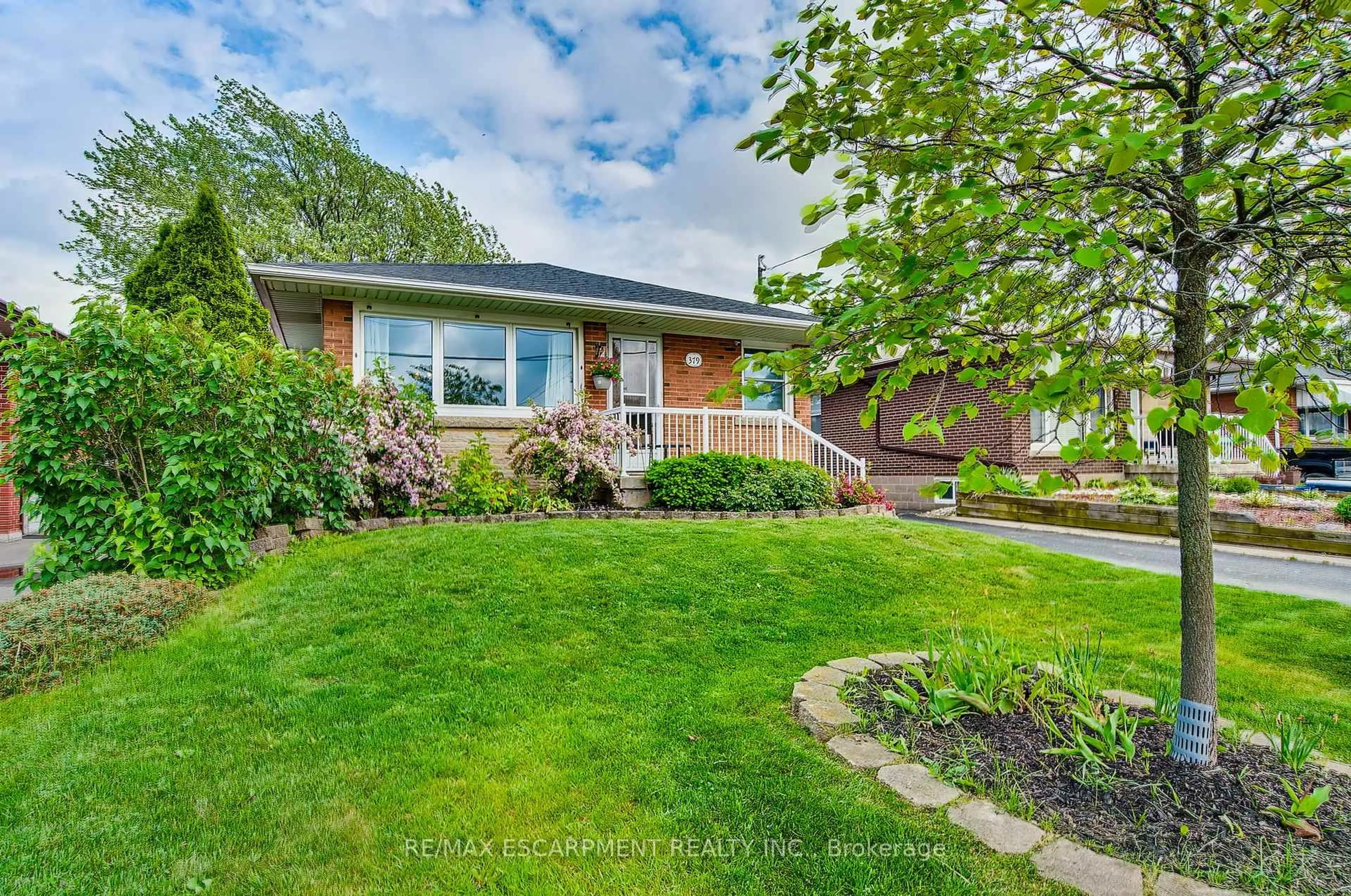 Home with brick exterior material, street for 379 East 18th St, Hamilton Ontario L9A 4P7