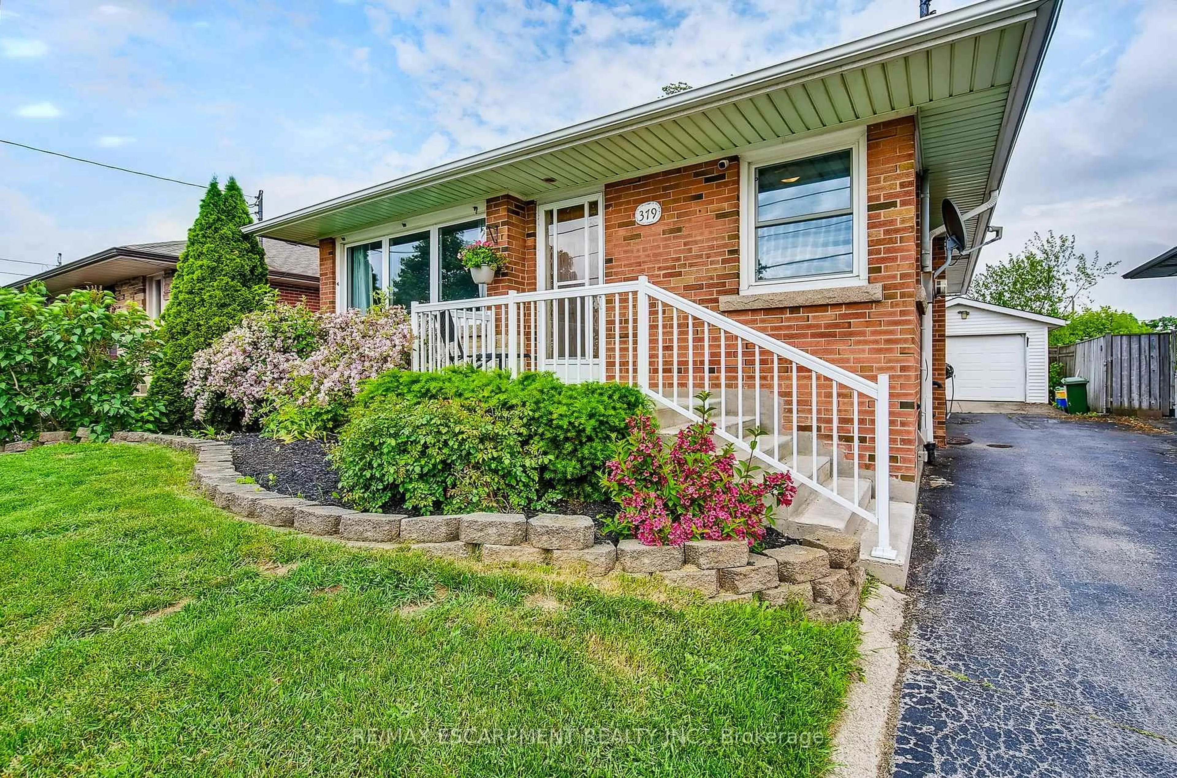 Home with brick exterior material, street for 379 East 18th St, Hamilton Ontario L9A 4P7