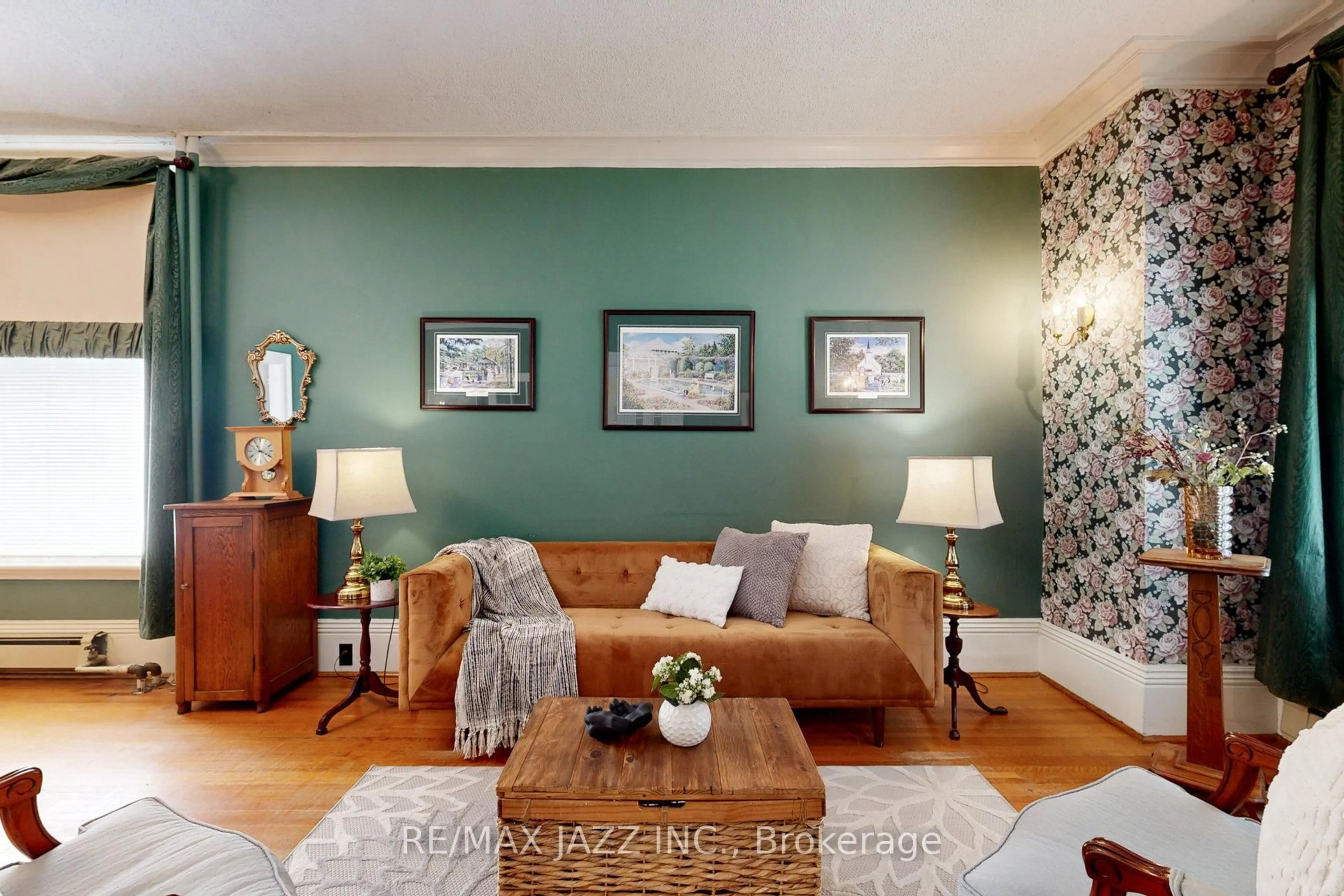 Living room with furniture, wood/laminate floor for 243 Brant Ave, Brantford Ontario N3T 3J4