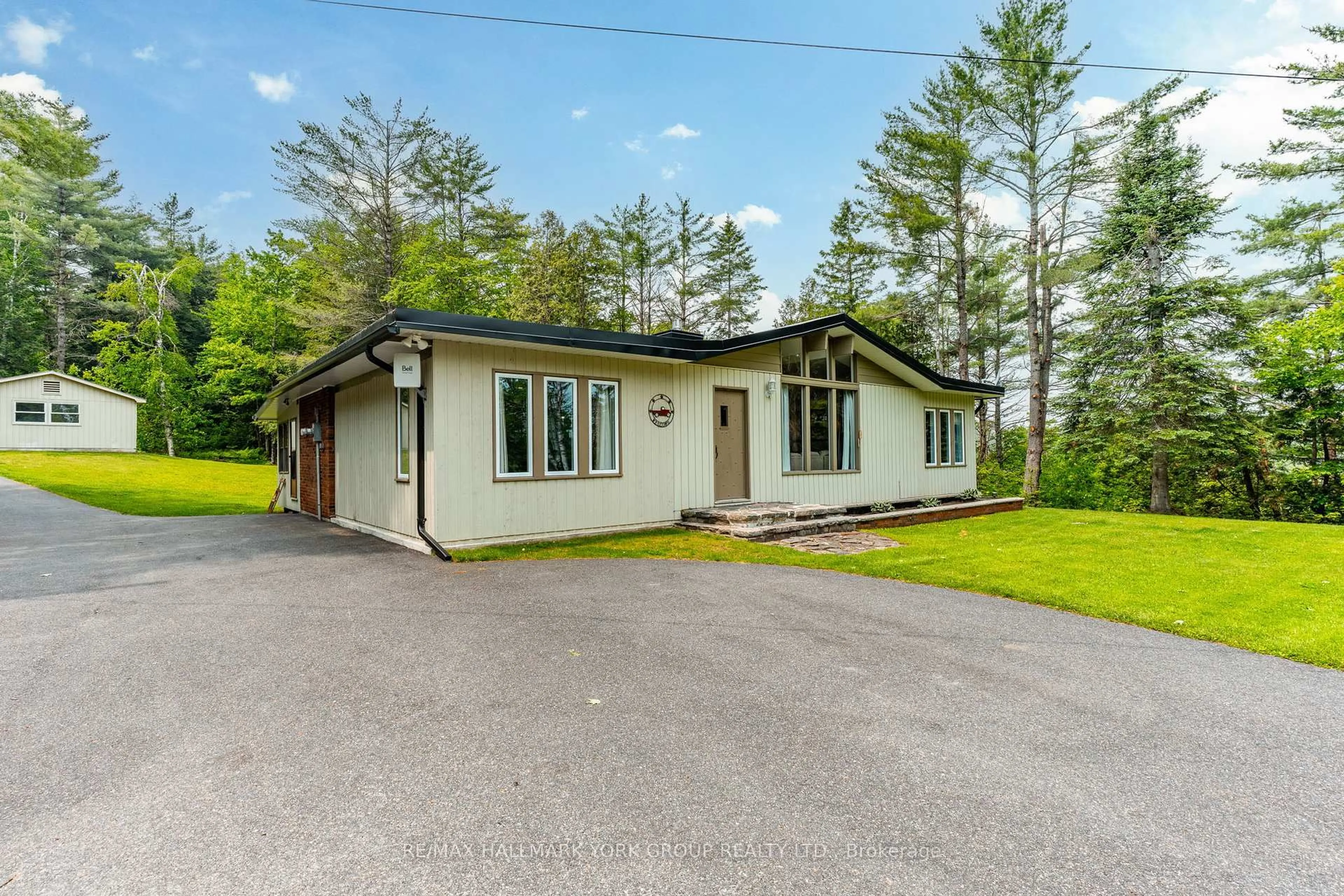 A pic from outside/outdoor area/front of a property/back of a property/a pic from drone, street for 4001 County 121 Rd, Kawartha Lakes Ontario K0M 2A0