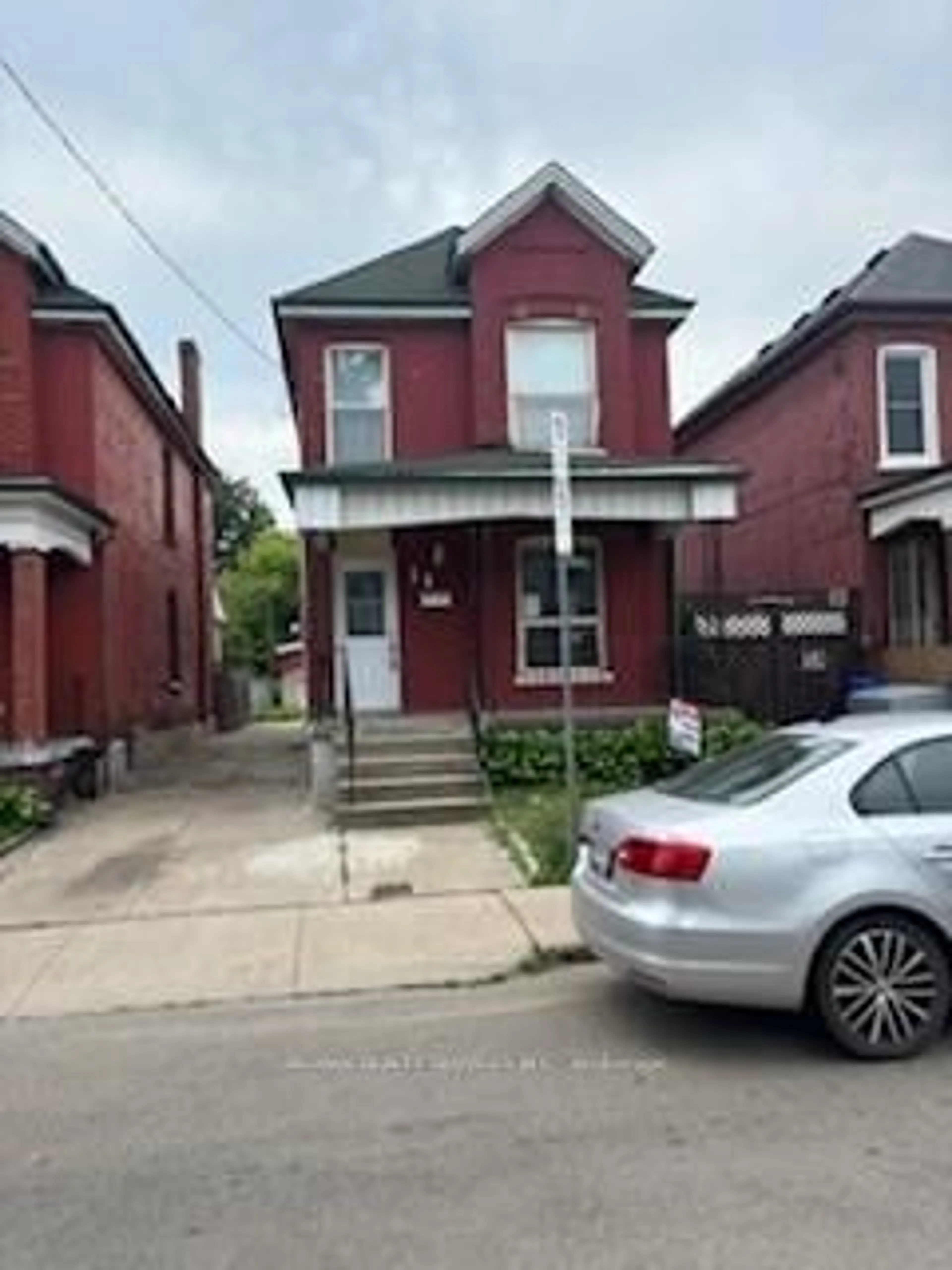 Home with brick exterior material, street for 14 Clinton St, Hamilton Ontario L8L 3J8