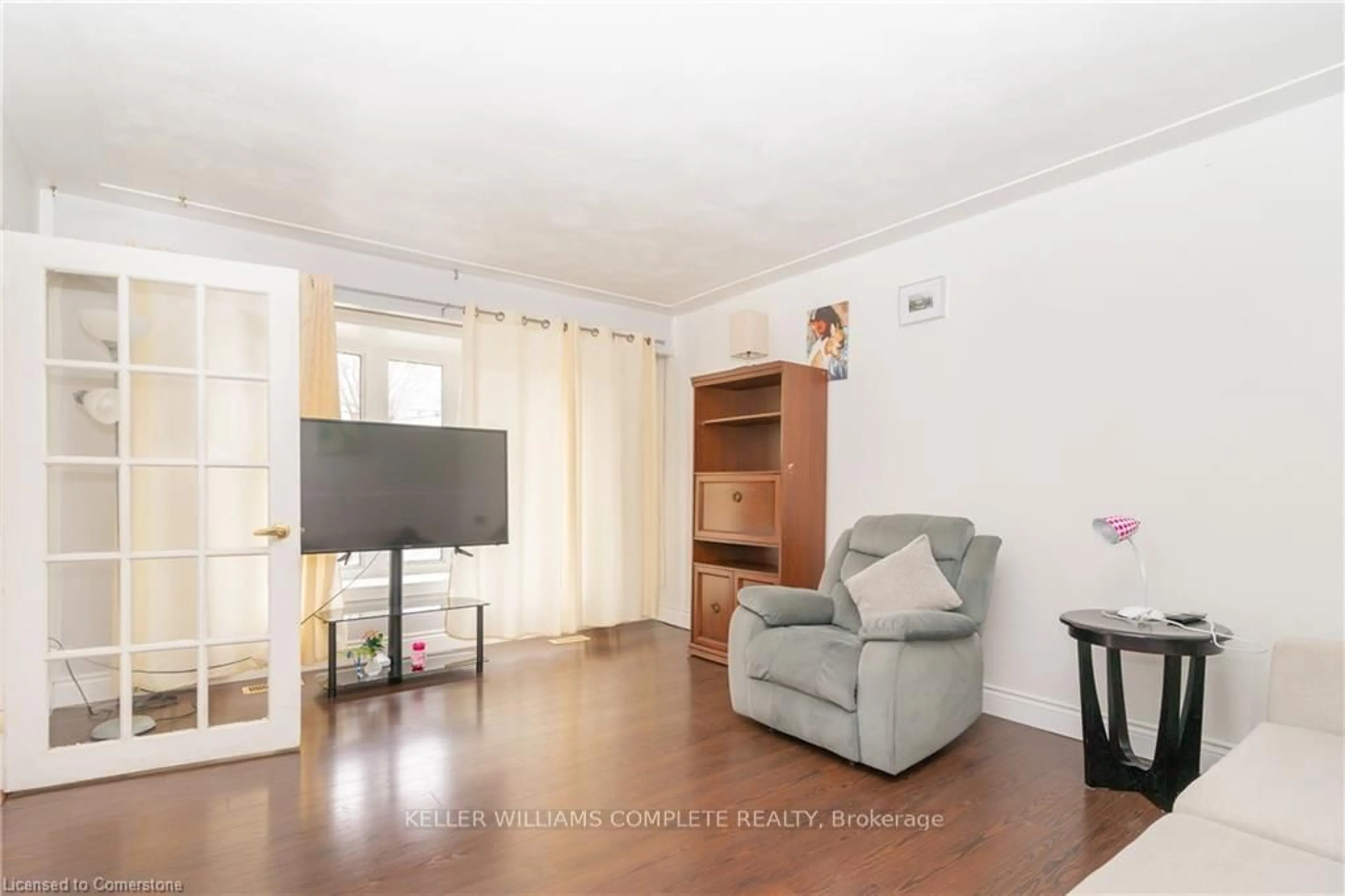 Living room with furniture, unknown for 574 Upper Sherman Ave, Hamilton Ontario L8V 3M1