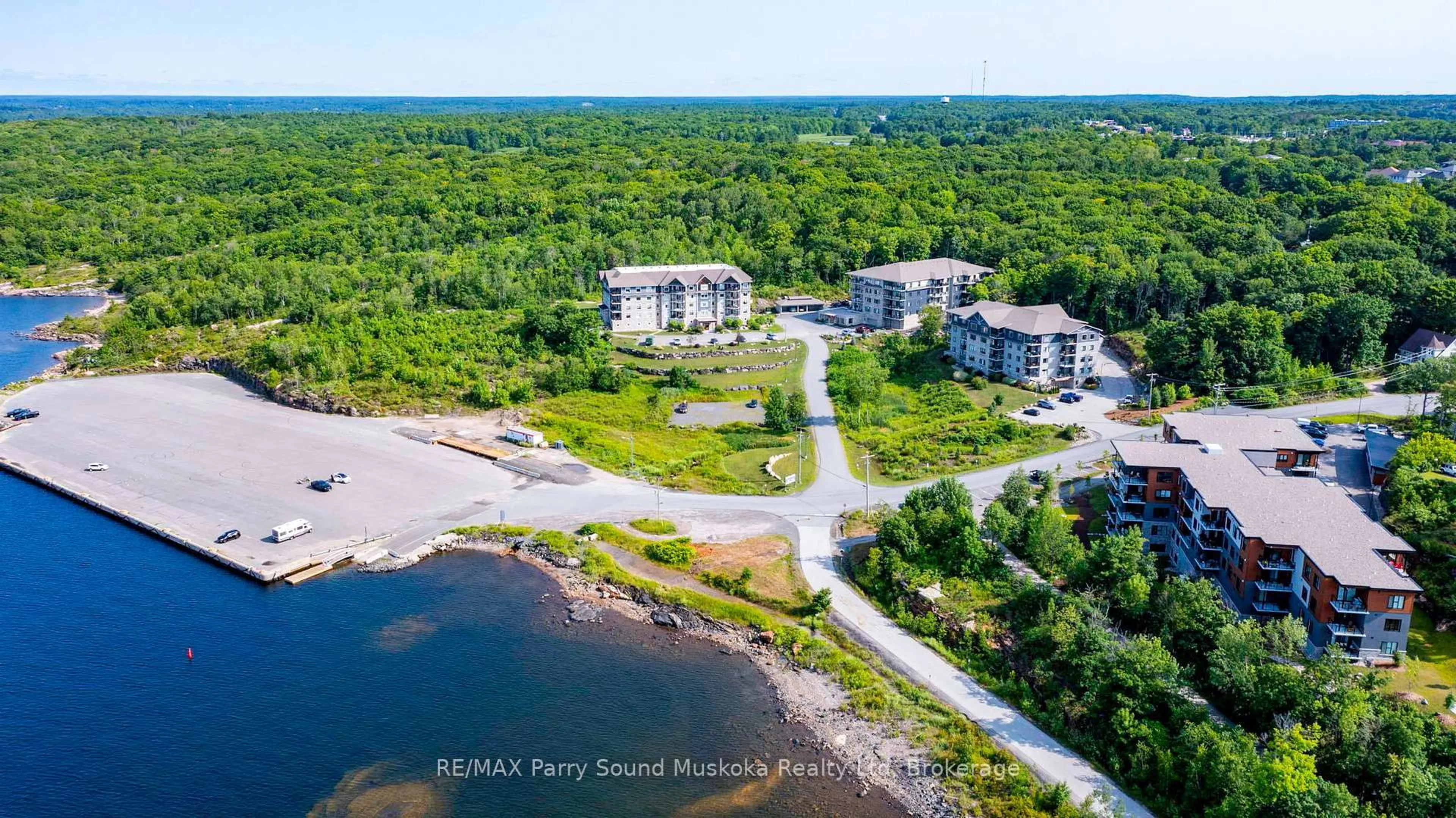 A pic from outside/outdoor area/front of a property/back of a property/a pic from drone, water/lake/river/ocean view for 11B SALT DOCK Rd #303, Parry Sound Ontario P2A 3B6