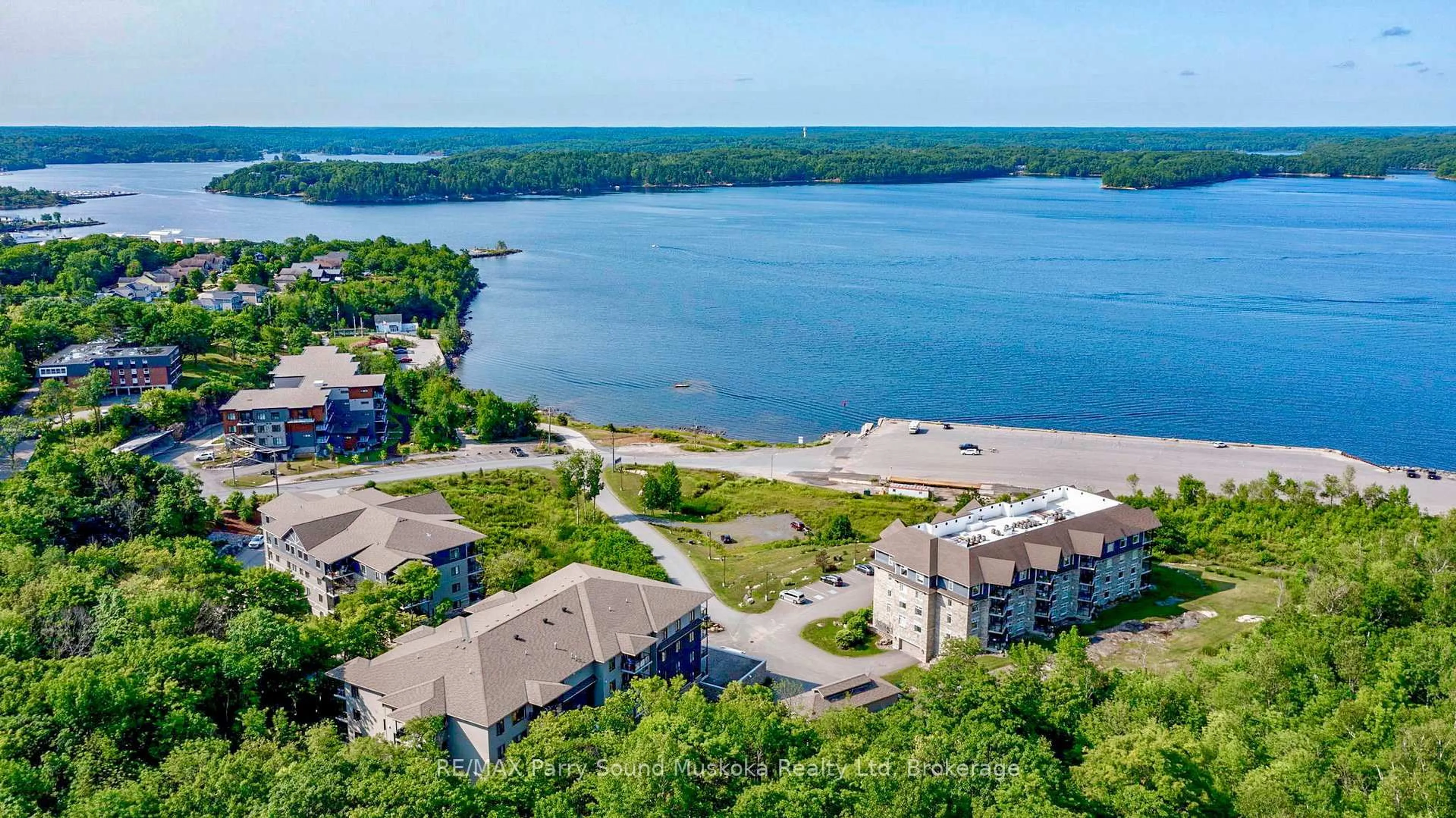 A pic from outside/outdoor area/front of a property/back of a property/a pic from drone, water/lake/river/ocean view for 11B SALT DOCK Rd #303, Parry Sound Ontario P2A 3B6