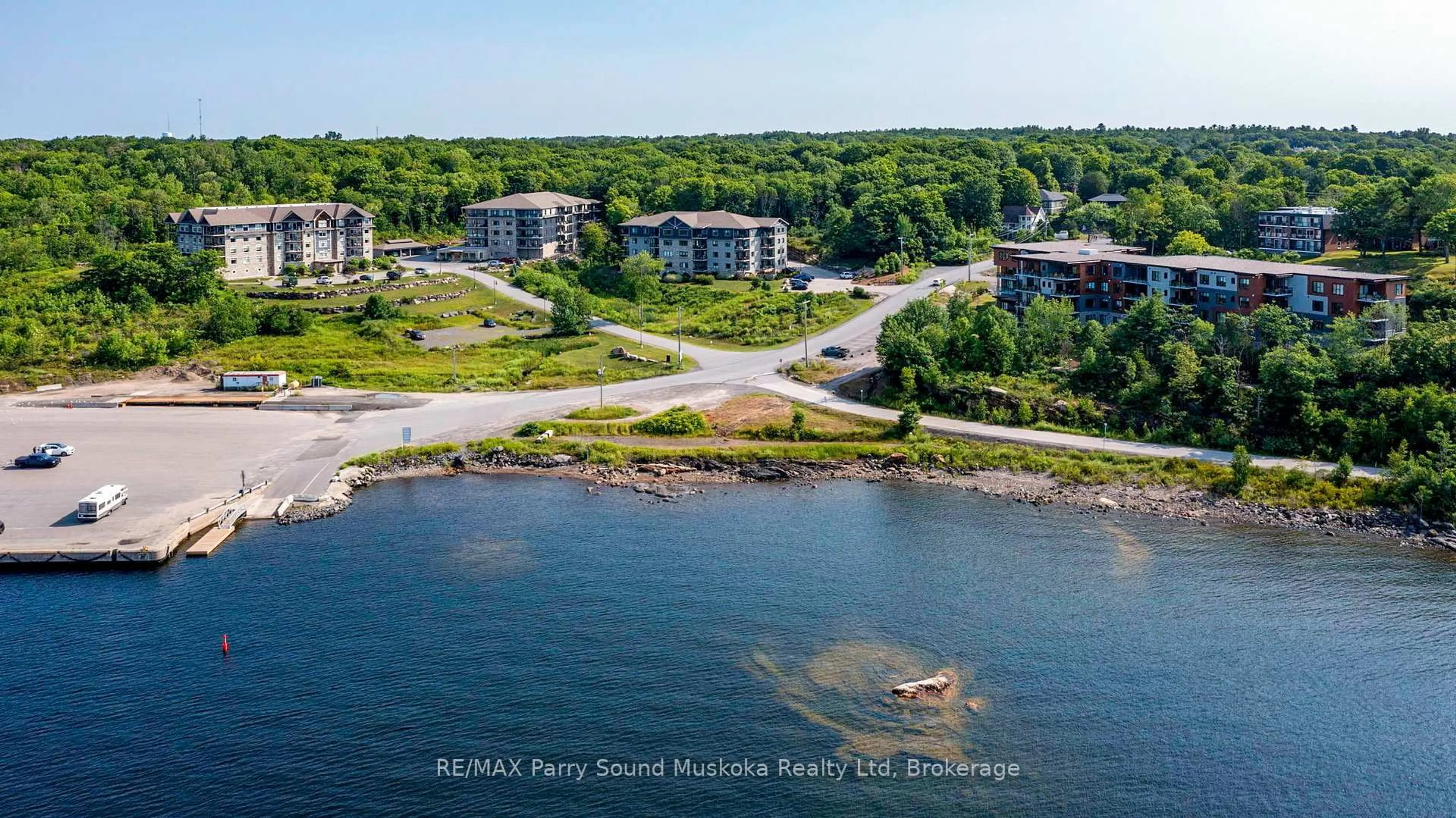 A pic from outside/outdoor area/front of a property/back of a property/a pic from drone, water/lake/river/ocean view for 11B SALT DOCK Rd #303, Parry Sound Ontario P2A 3B6