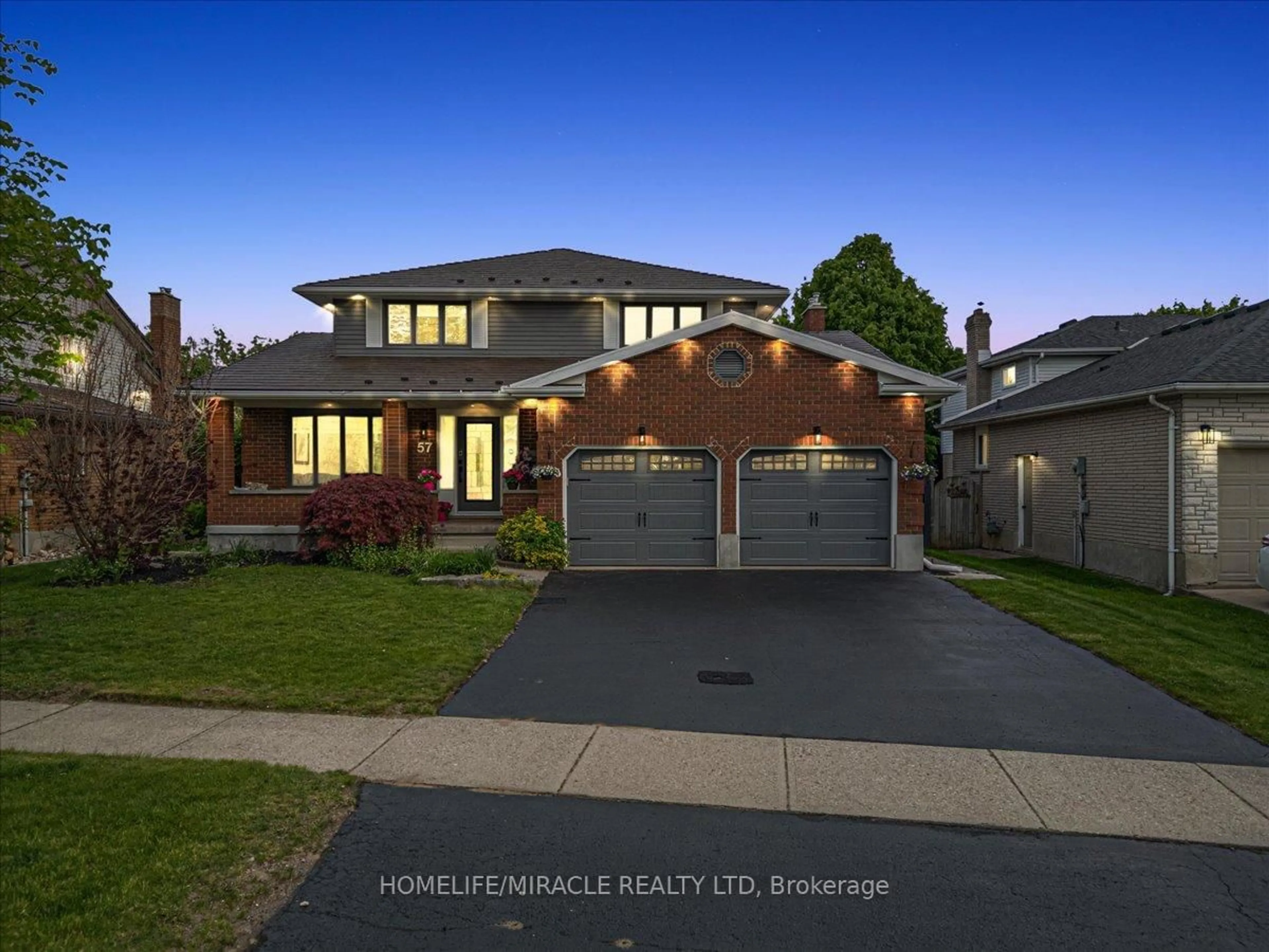 Home with brick exterior material, street for 57 Springmount Dr, Kitchener Ontario N2A 3V2