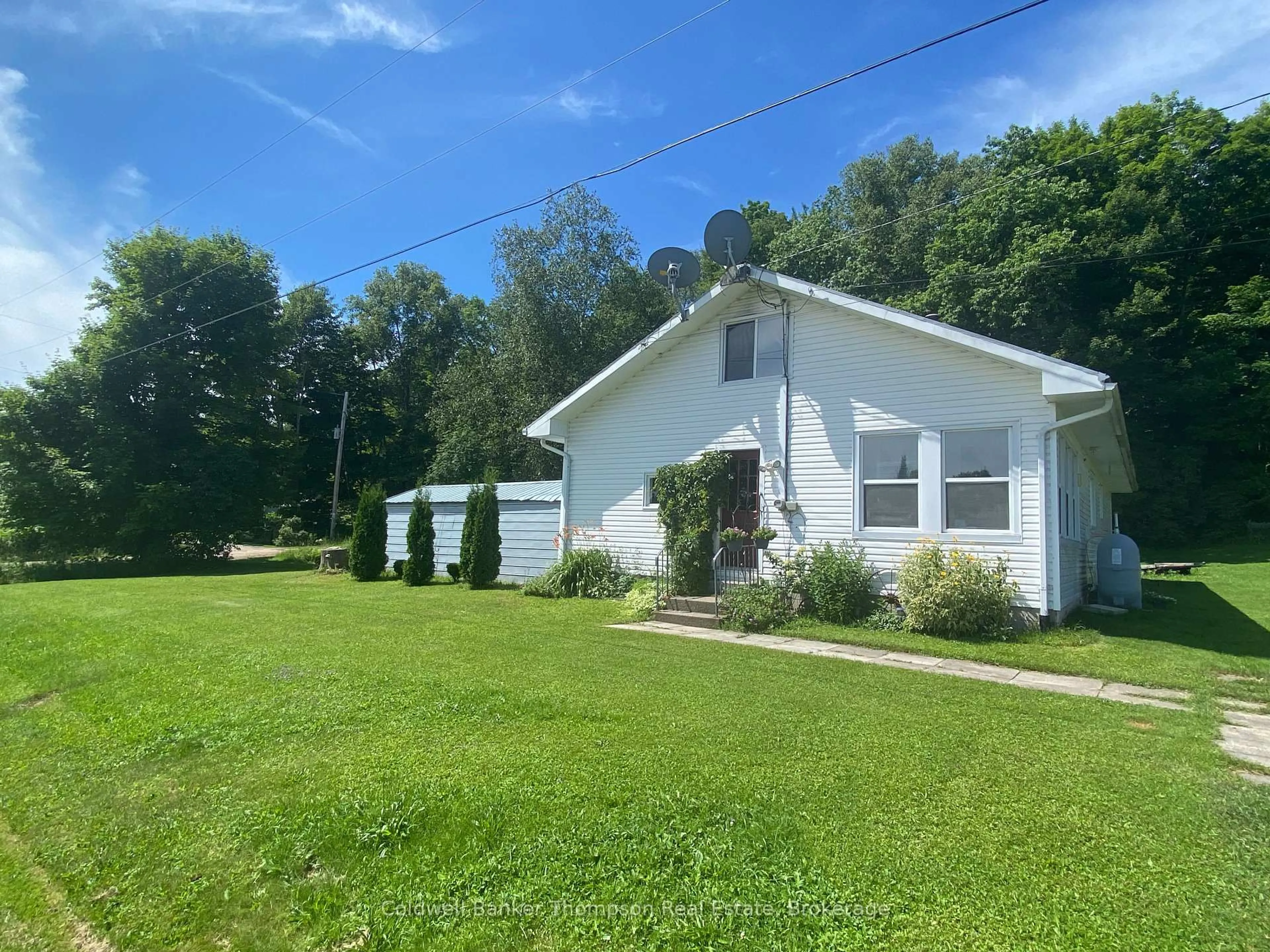 A pic from outside/outdoor area/front of a property/back of a property/a pic from drone, unknown for 172 Bunker Hill Rd, Machar Ontario P0A 1X0