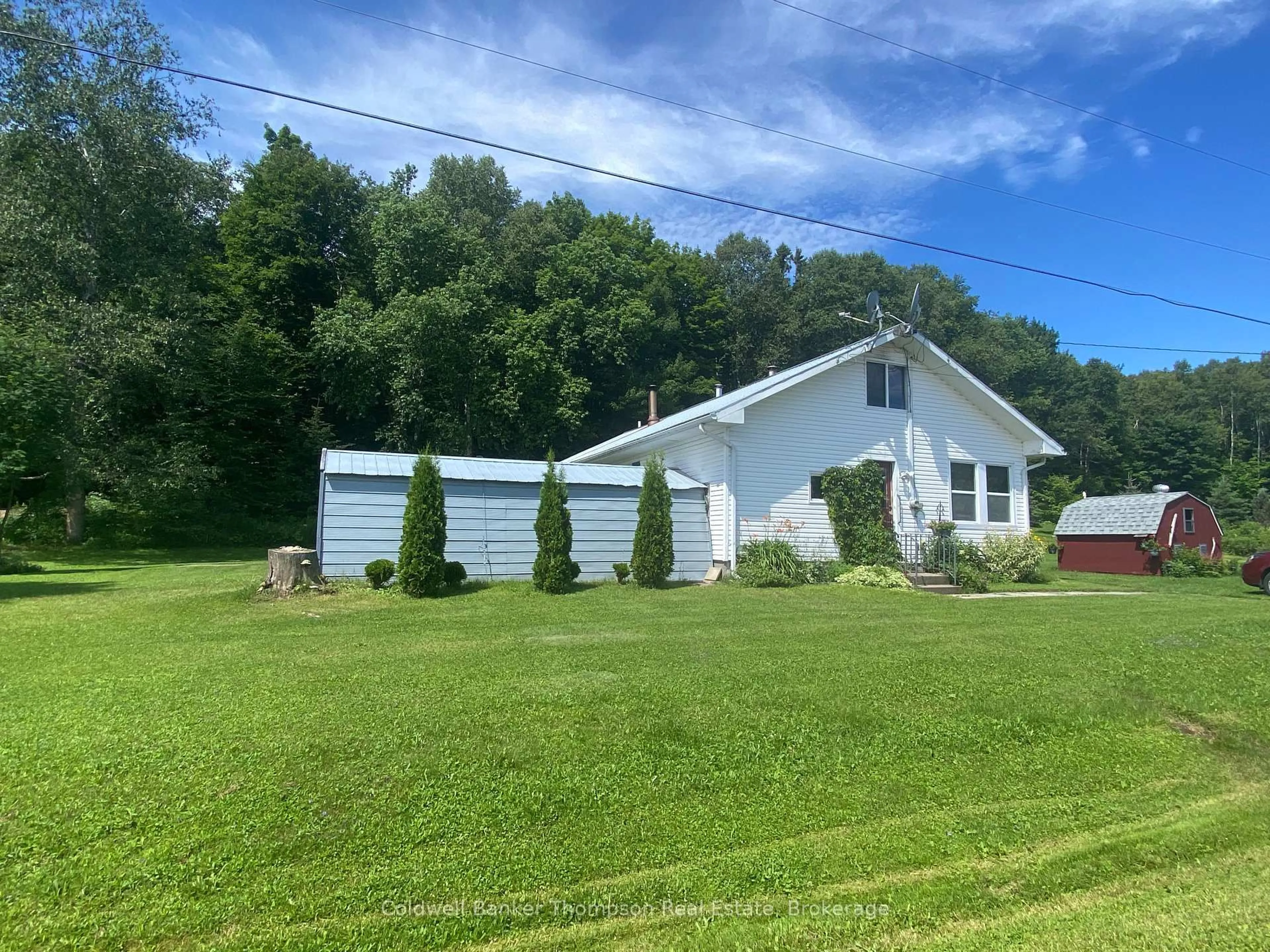 A pic from outside/outdoor area/front of a property/back of a property/a pic from drone, unknown for 172 Bunker Hill Rd, Machar Ontario P0A 1X0