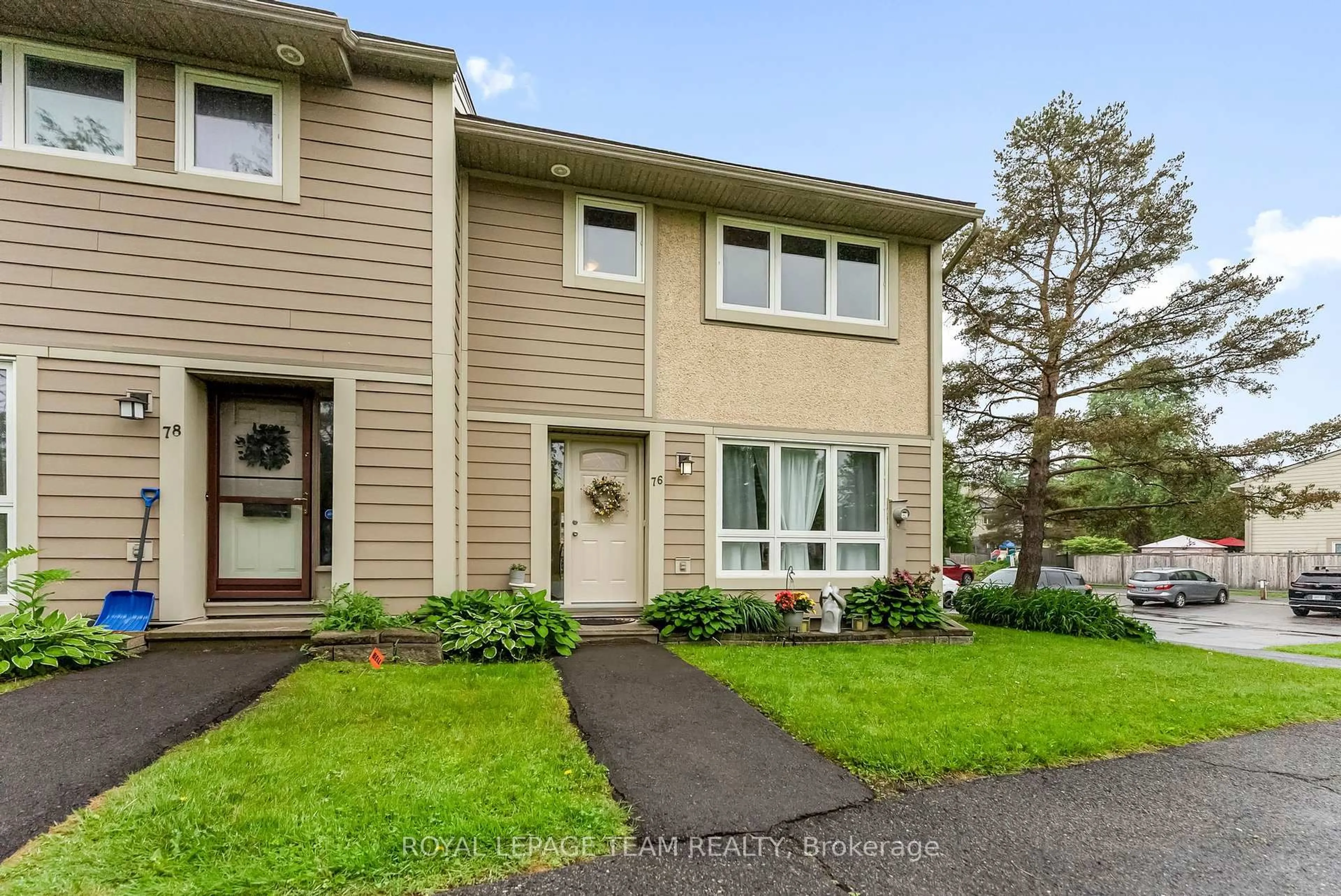 Home with vinyl exterior material, street for 76 Peary Way, Ottawa Ontario K2L 1Z8
